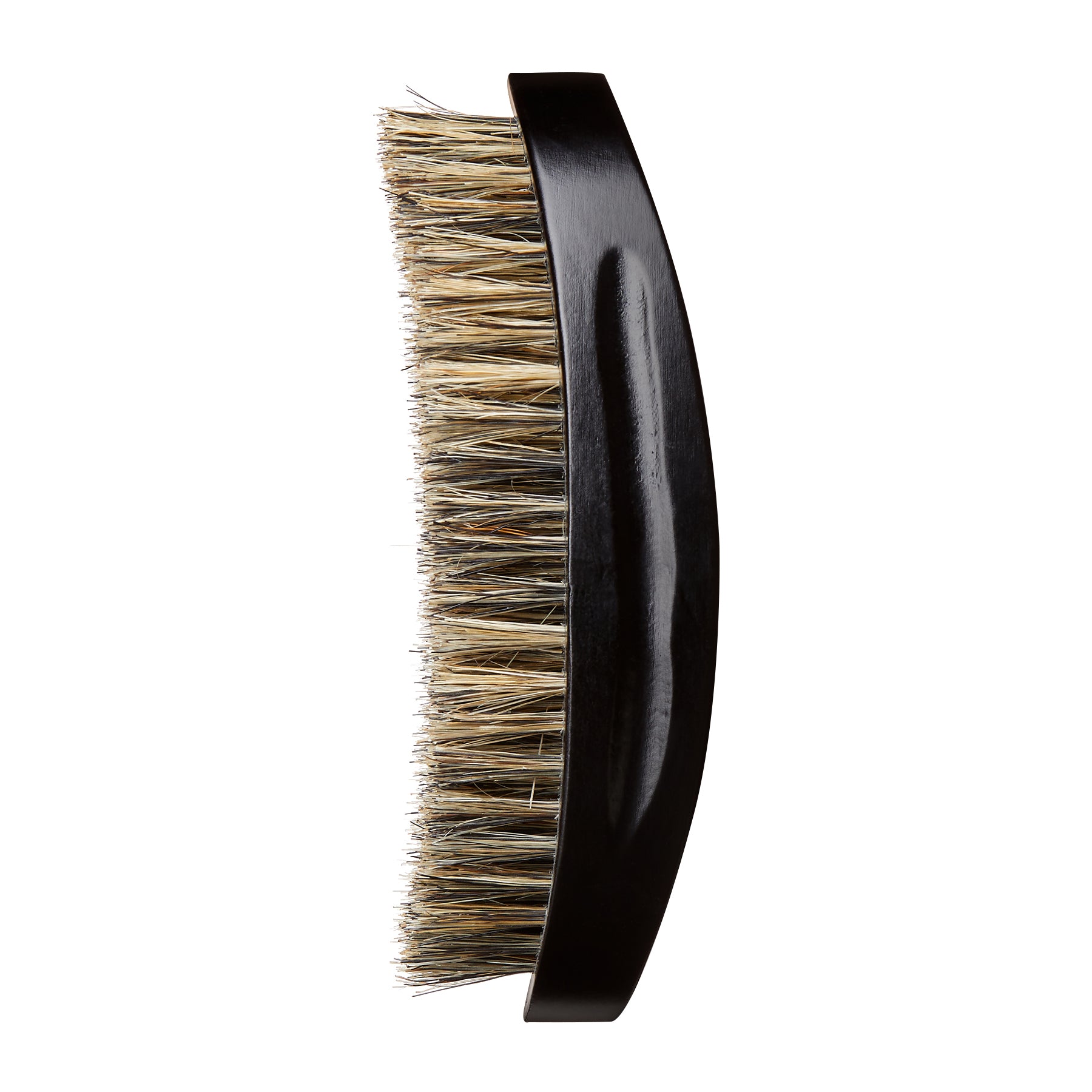 Medium-soft boar bristle hair brush with a curved black polished palm handle, shown in close-up side view on a white background.
