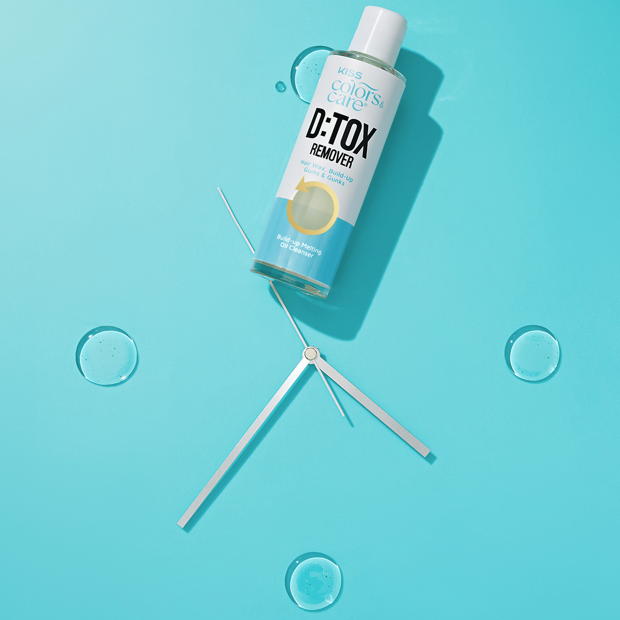 D:TOX remover bottle on a blue background with bubbles