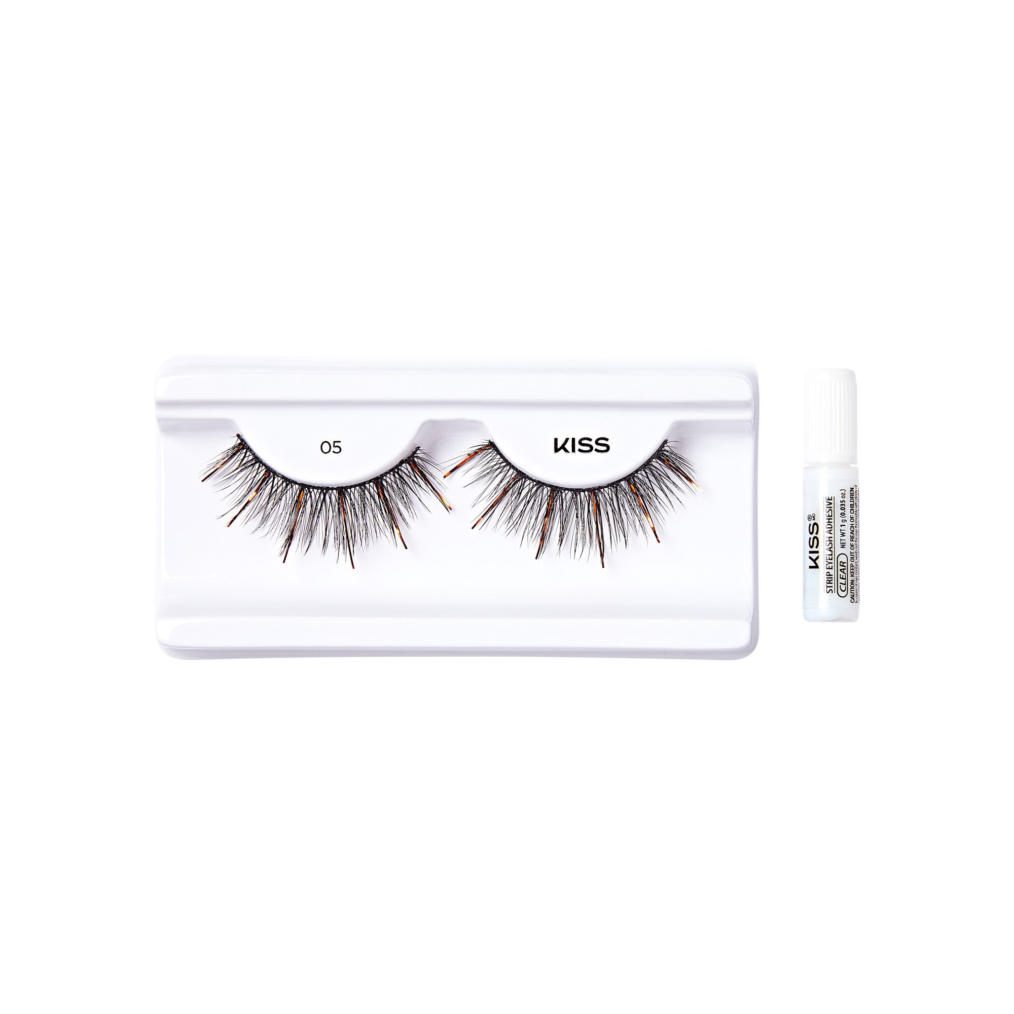 The image shows a set of false eyelashes from the brand "KISS." The eyelashes are displayed on a white plastic tray, with the number "05" printed on the left side of the tray. The tray holds a pair of voluminous, multi-layered lashes that appear to be designed for a dramatic look. To the right of the tray, there is a small white tube of adhesive, also branded with "KISS," which is used to apply the false eyelashes. The overall presentation is clean and minimalistic, highlighting the product.