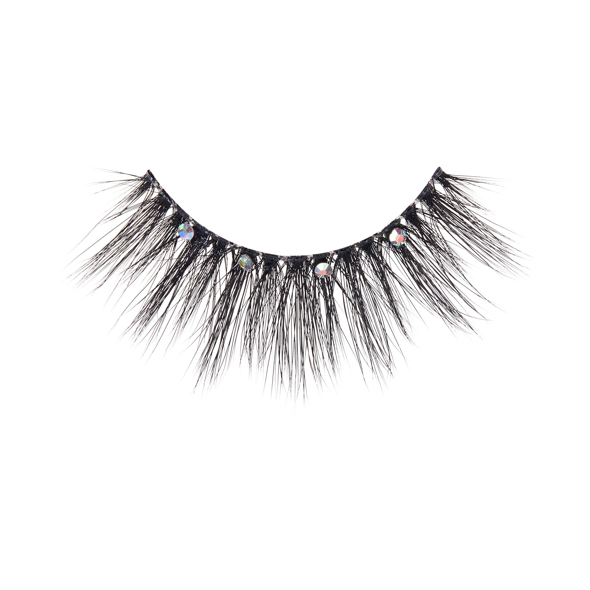 The image shows a single false eyelash strip. The eyelash is black and features long, wispy fibers that taper towards the ends. The base of the eyelash strip is adorned with small, reflective rhinestones, adding a touch of sparkle and glamour. The overall design is dramatic and intended to enhance the appearance of the eyes when worn.