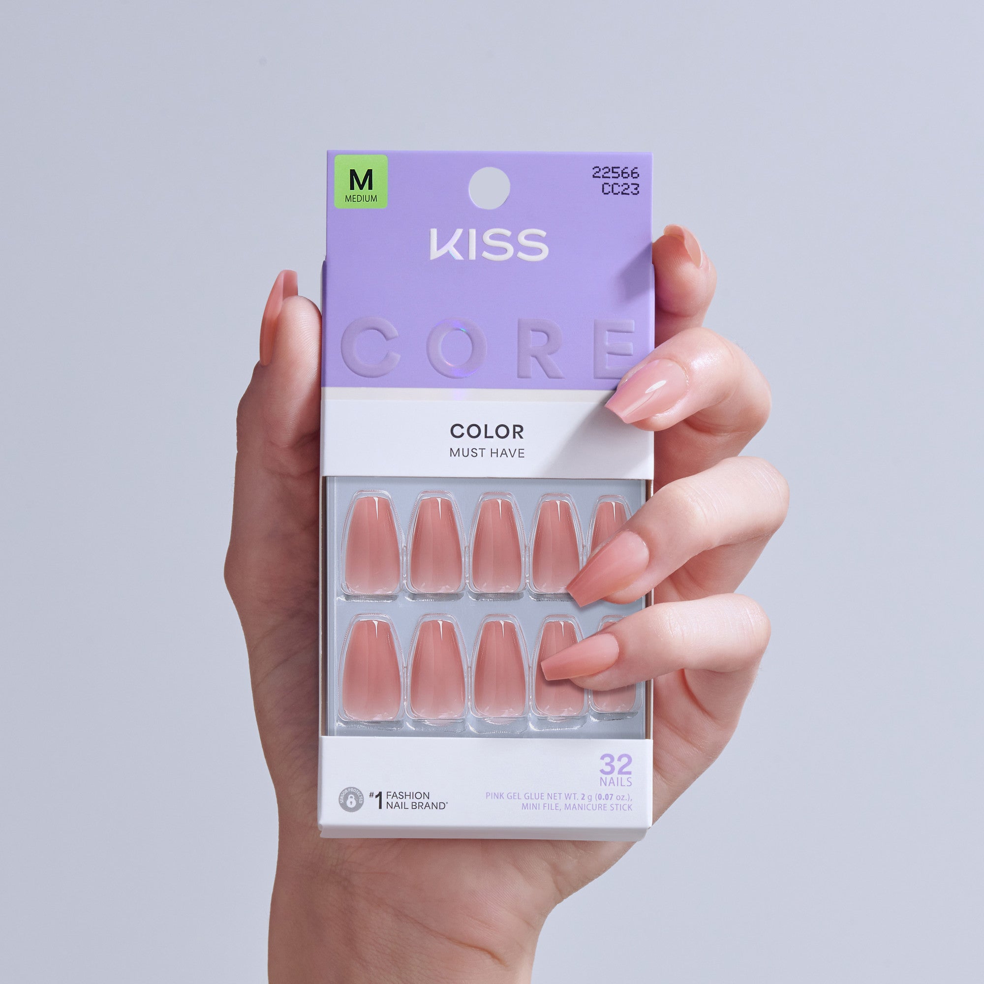 KISS Core Color Must Have press-on nails in pink, size M, 32 nails displayed in packaging.