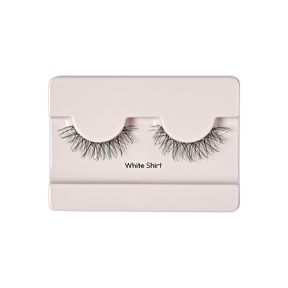 The New Natural false lashes in White Shirt by KISS shown outside of the packaging