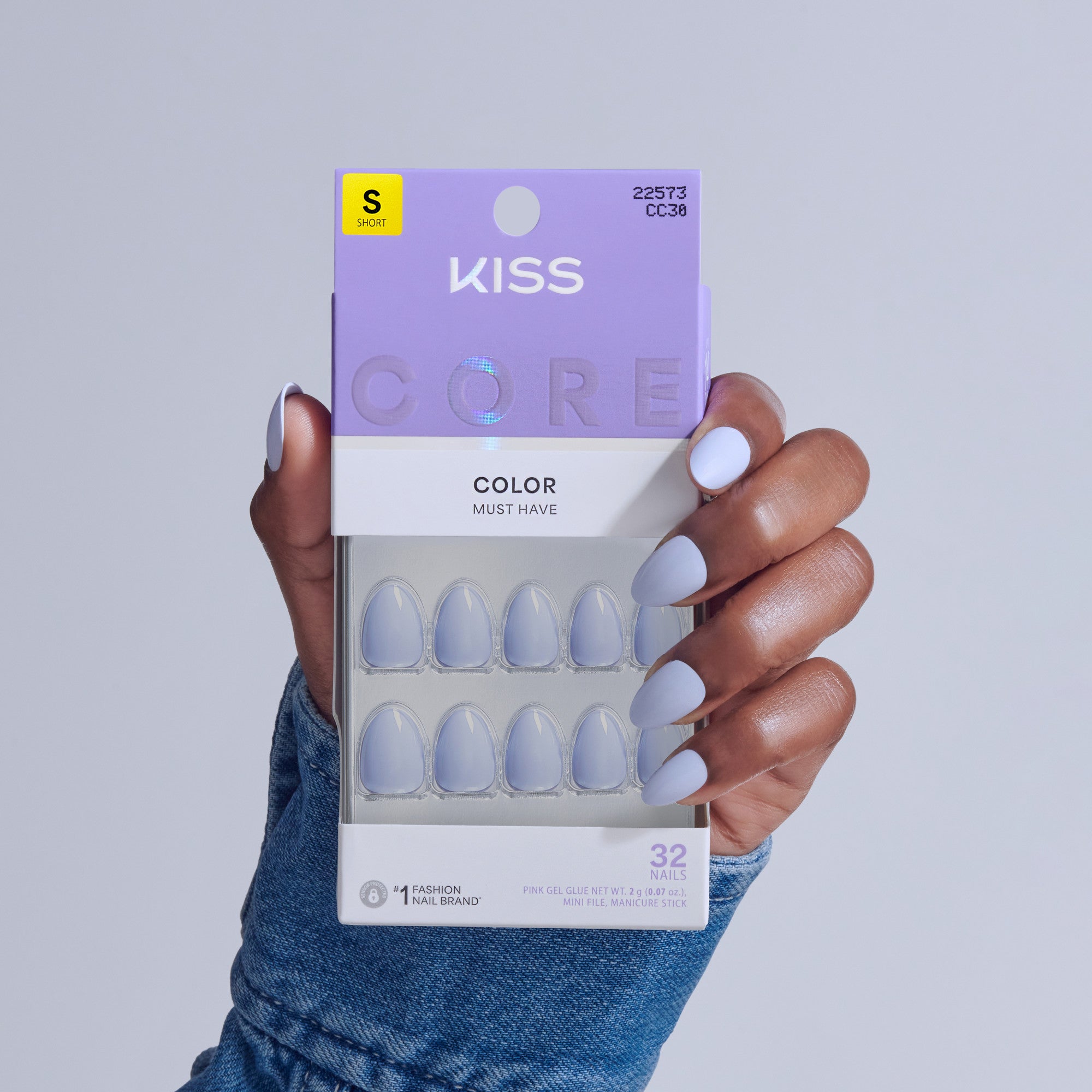 KISS Core Color Must Have press-on nails in light purple, size short, displayed on hand