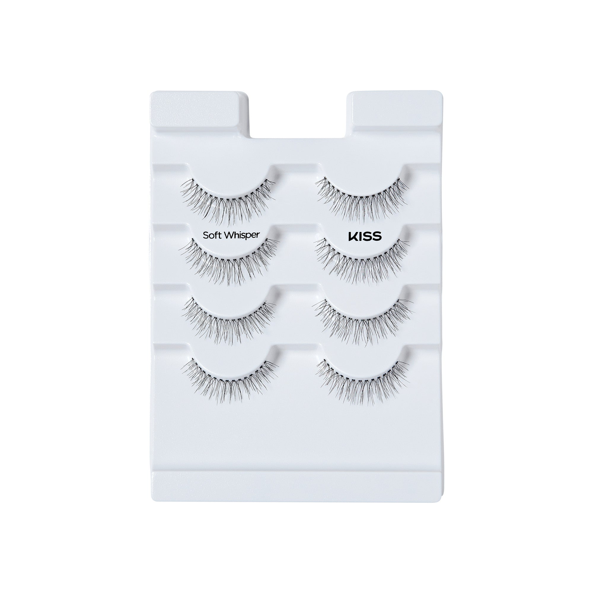 The image features a display of false eyelashes arranged on a white tray. There are four pairs of lashes, each labeled with the name "Soft Whisper" and the brand "KISS." The lashes vary in style, showcasing different lengths and thicknesses, designed to enhance the appearance of natural eyelashes. The overall presentation is clean and organized, emphasizing the product&