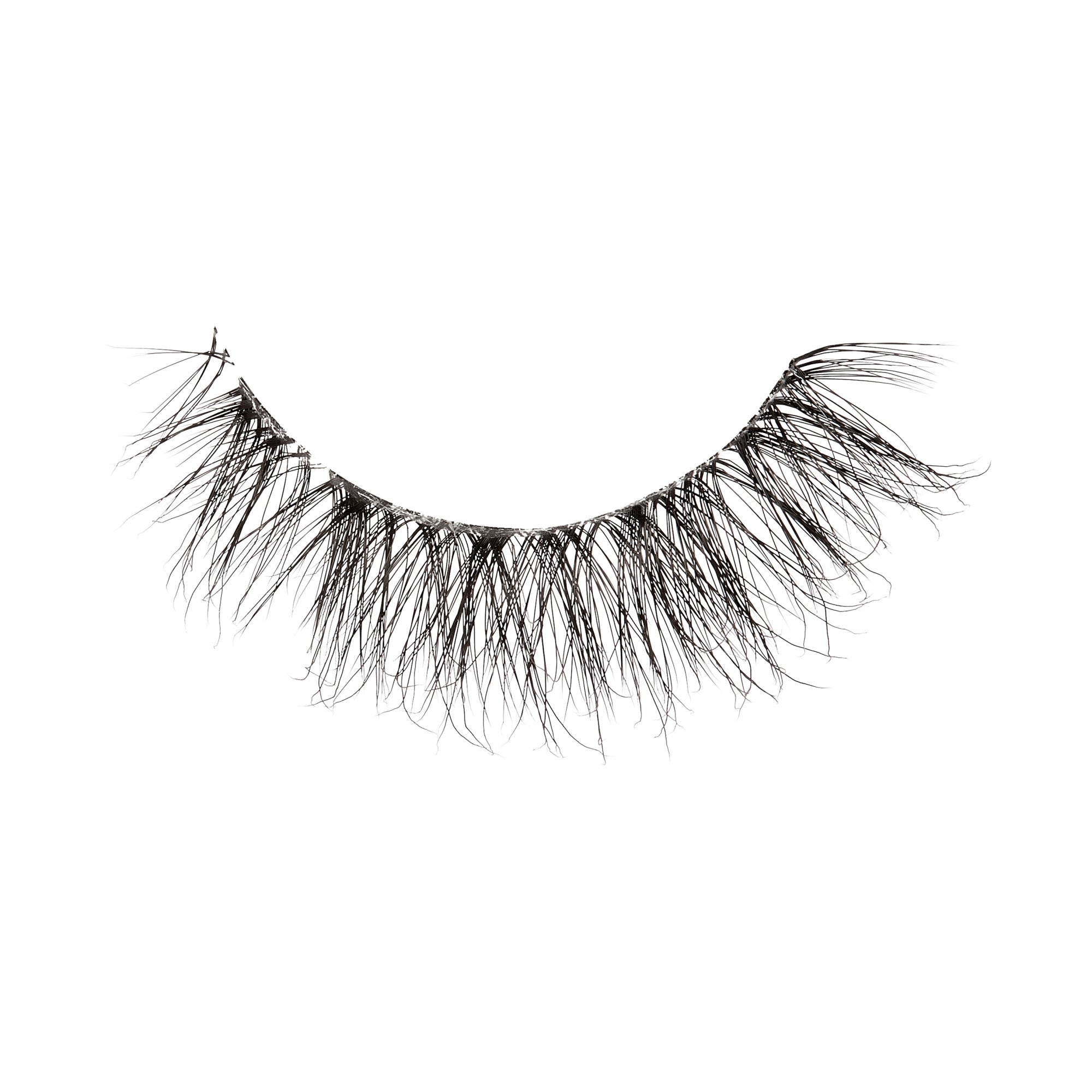 The image shows a single strip of false eyelashes. The eyelashes are black and appear to be voluminous with a wispy, natural look. The individual lashes vary in length, creating a fluttery and full appearance. The strip is curved to fit the natural shape of the eyelid.