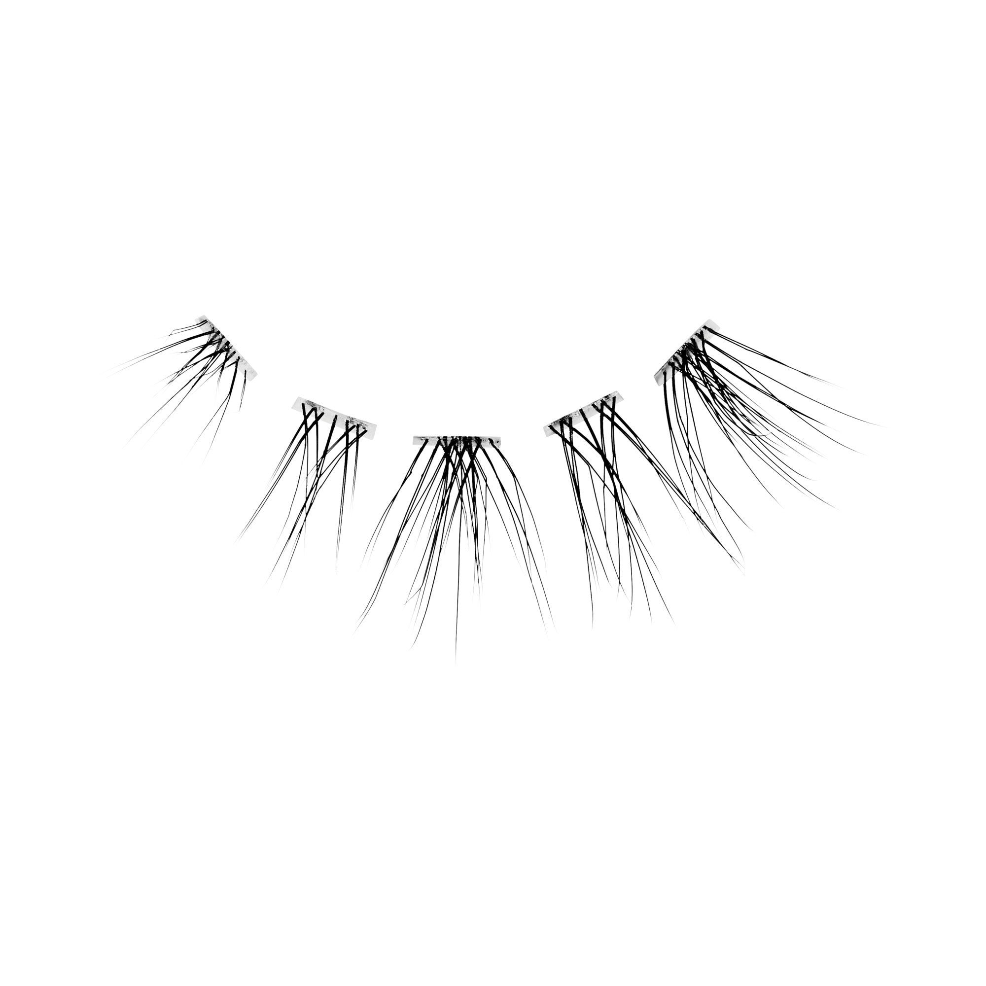 The image features a set of false eyelashes displayed against a plain white background. The lashes are long and wispy, with varying lengths that create a natural, fluttery appearance. They are arranged in a curved shape, resembling the natural arch of eyelids, and are designed to enhance the eyes by adding volume and length. The overall look is elegant and suitable for makeup applications.