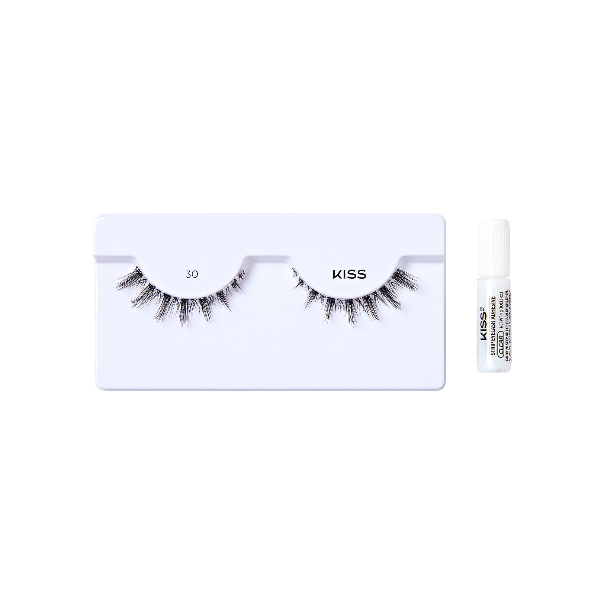 The image shows a set of false eyelashes from the brand "KISS." The eyelashes are displayed on a white tray with two pairs of lashes labeled "30." The lashes are long and voluminous, designed to enhance the appearance of natural eyelashes. To the right of the tray, there is a small tube of adhesive glue, also branded with "KISS," which is used to apply the false eyelashes. The overall presentation is clean and minimalistic, emphasizing the product&