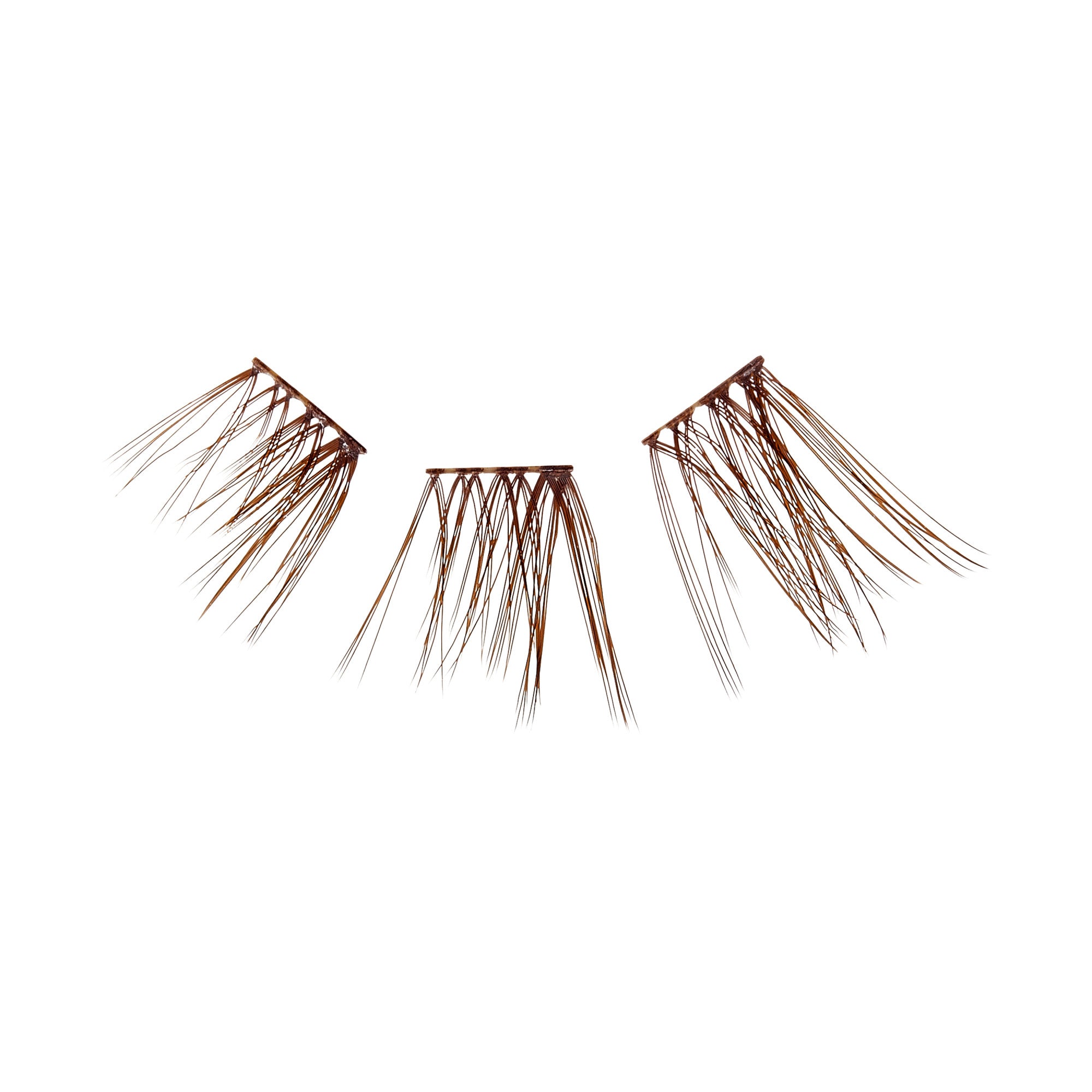 The image shows three separate clusters of false eyelashes. Each cluster consists of multiple individual lashes that are long, thin, and brown in color. The lashes are arranged in a fan-like pattern, with the base of each cluster appearing to be attached to a small strip or band. The clusters are positioned in a way that suggests they are meant to be applied to the outer corners of the eyes to enhance the appearance of natural eyelashes.