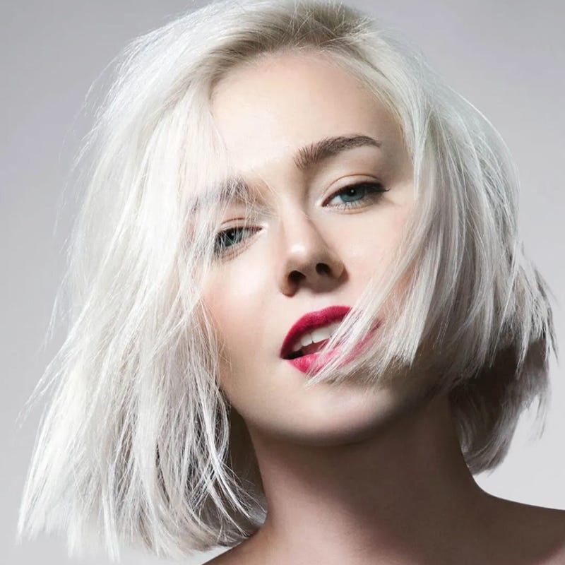 Model with white hair coloring using KISS Colors And Care complete bleach hair kit. 