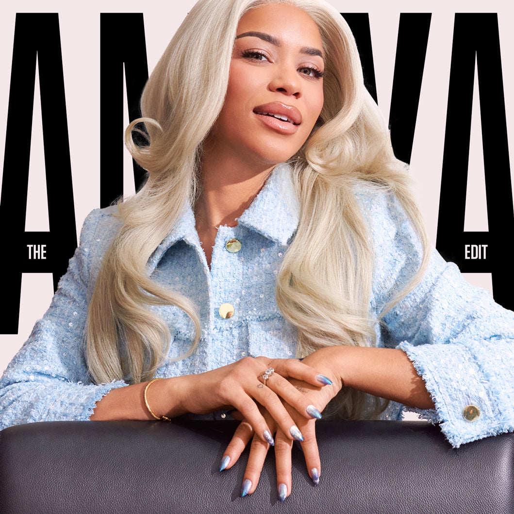 Woman with long blonde hair wearing a light blue denim jacket on a magazine cover with 'AMAYA' branding.