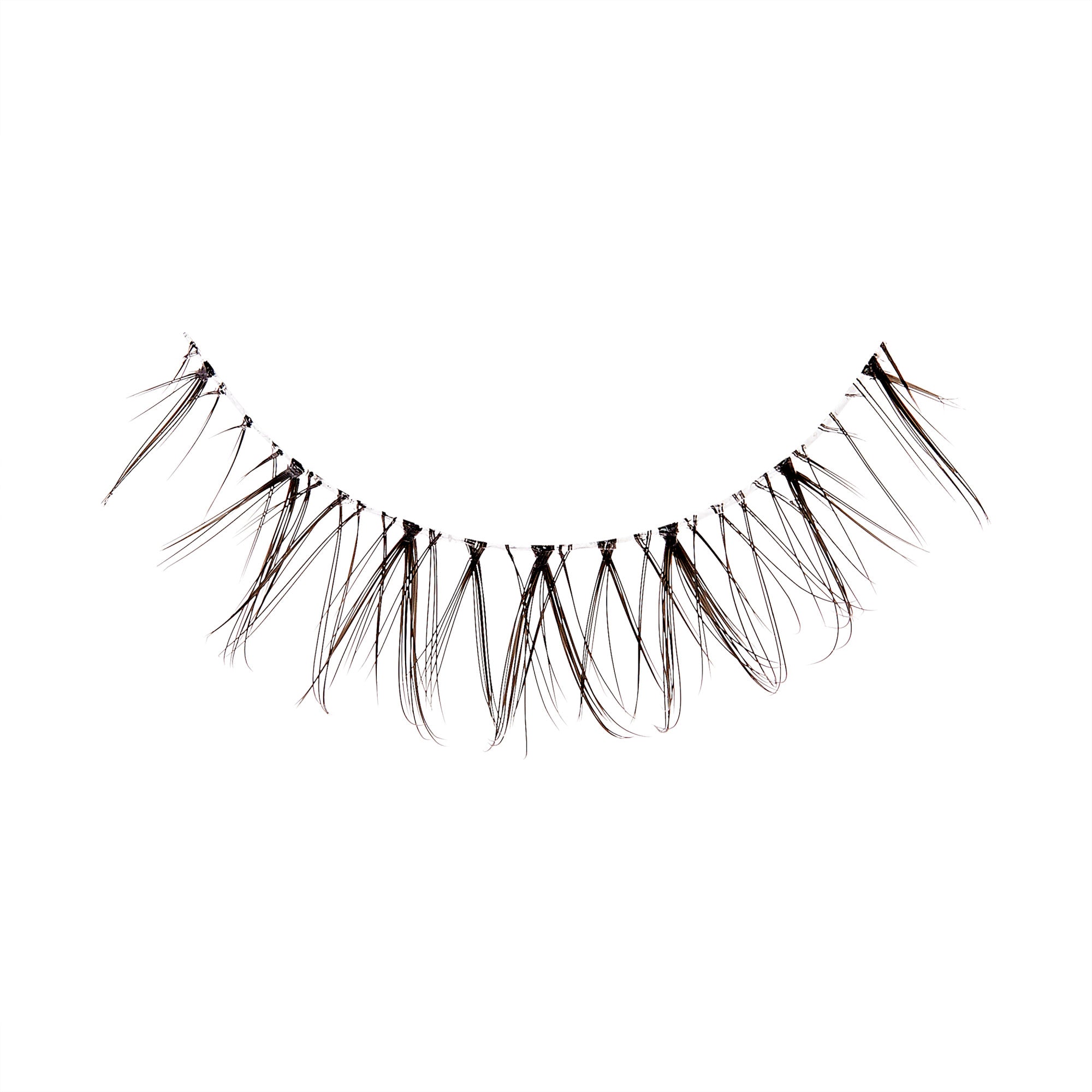 The image shows a single strip of false eyelashes. The eyelashes are arranged in a curved line, designed to mimic the natural shape of the eyelid. Each lash is long, thin, and slightly tapered, with a crisscross pattern at the base, giving them a wispy and voluminous appearance. The lashes are black and appear to be made of synthetic fibers. The background is plain white, highlighting the details of the eyelashes.