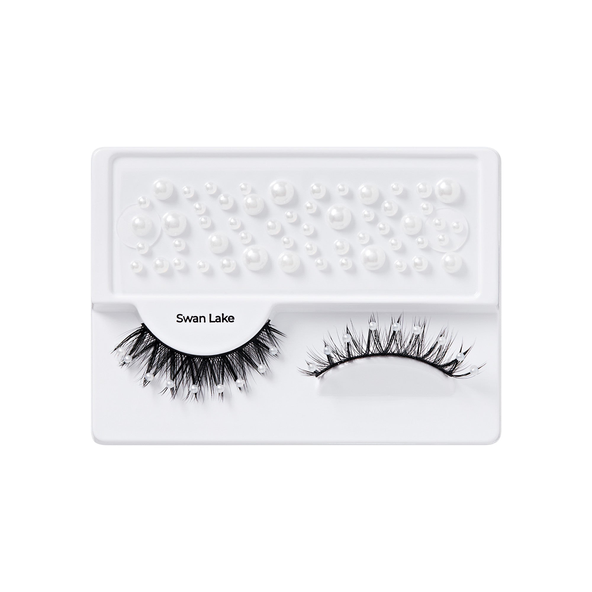 False eyelashes decorated with small white pearls named \