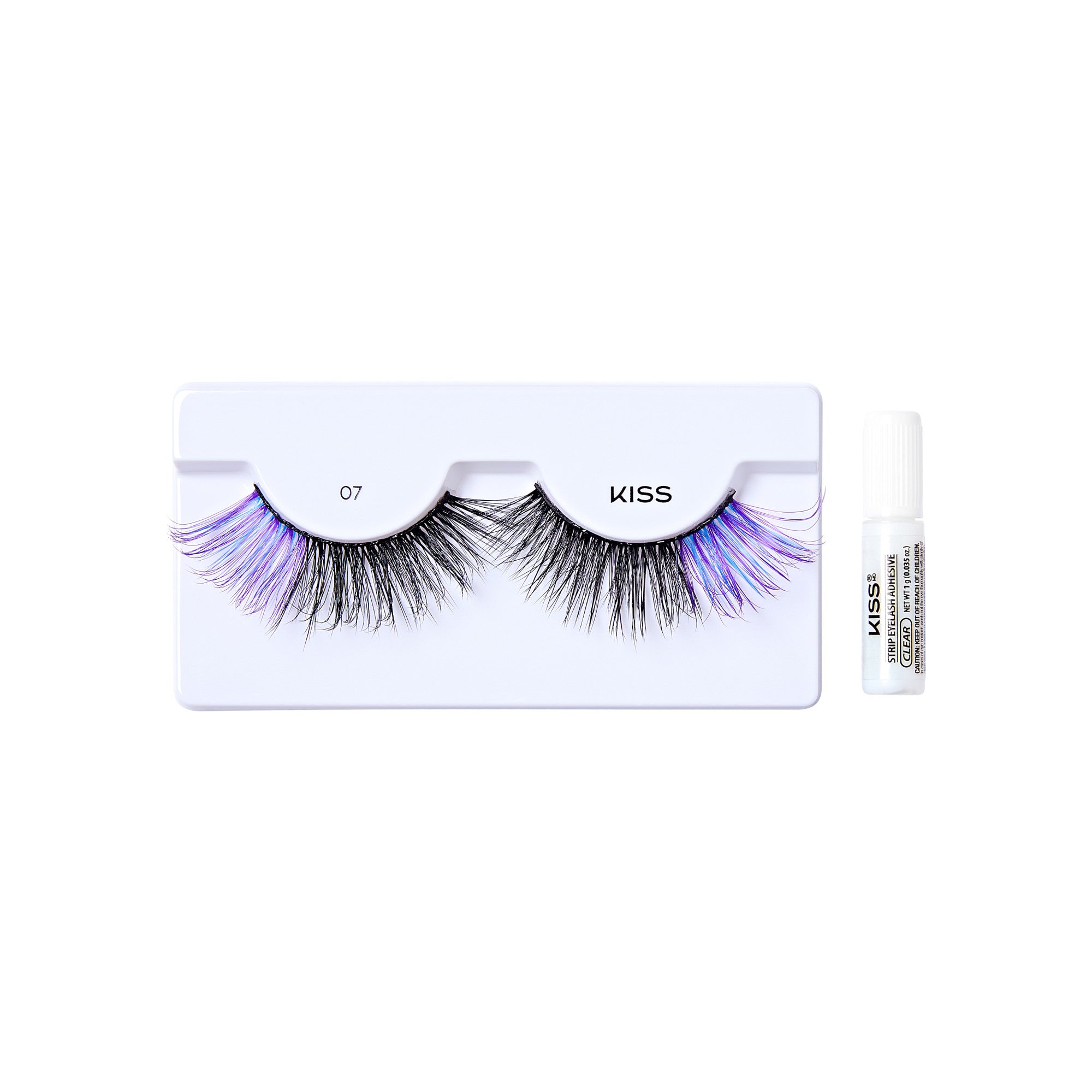 The image shows a set of false eyelashes from the brand "KISS." The eyelashes are displayed in a white plastic tray with two compartments, each holding one eyelash. The eyelashes are long and voluminous, with a mix of black and purple strands, giving them a dramatic and colorful appearance. The tray is labeled with the number "07" and the brand name "KISS." Additionally, there is a small tube of adhesive included in the set, placed to the right of the tray. The adhesive tube is white with black text.