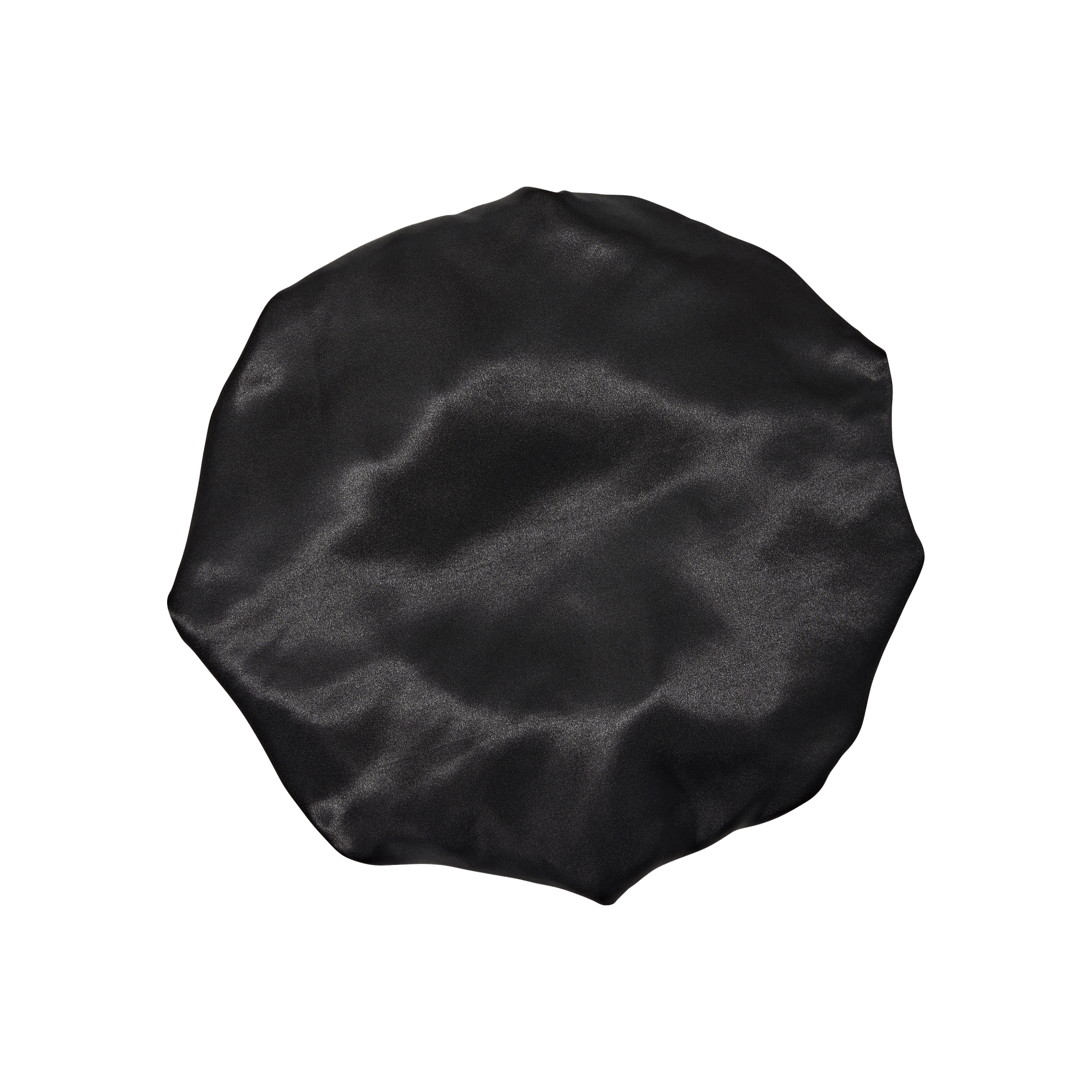 Black wrinkled fabric or material with textured surface against white background