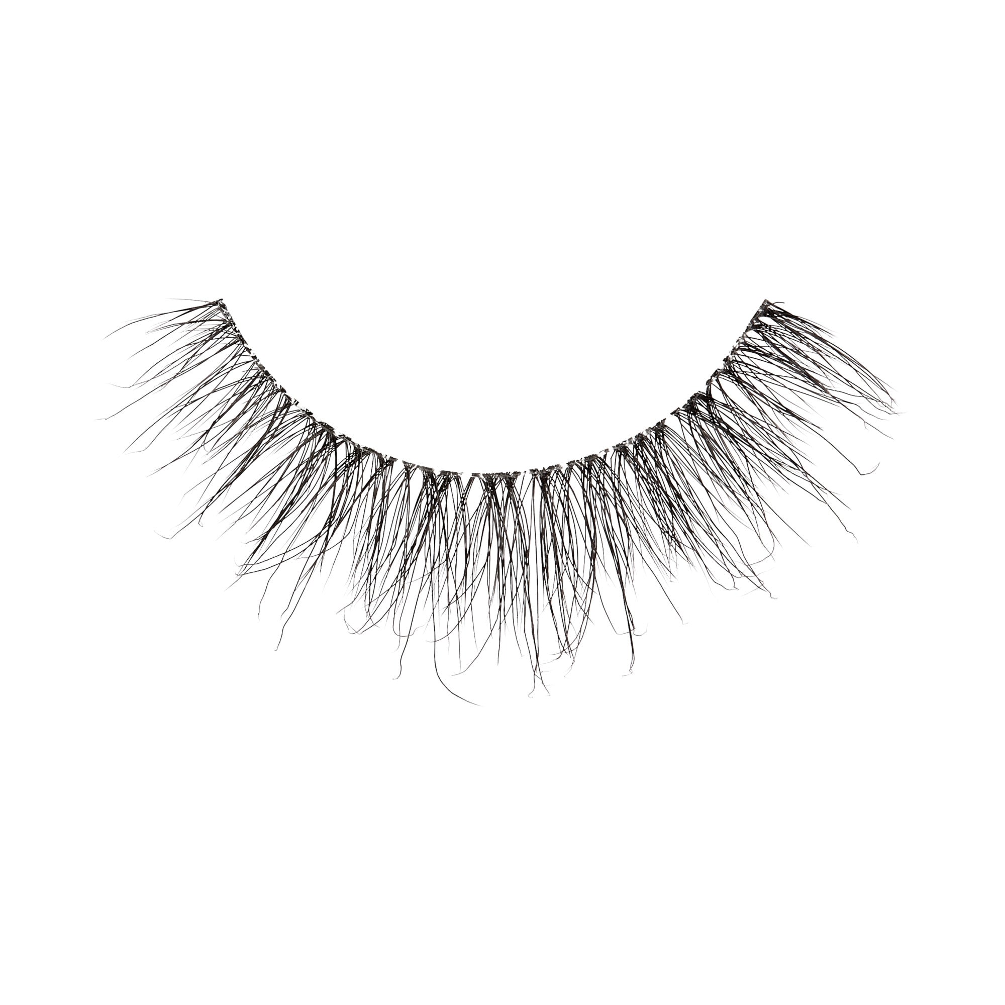 The image shows a single false eyelash. The eyelash is designed to be applied to the upper eyelid to enhance the appearance of natural eyelashes. It features a black band with numerous individual lash fibers extending from it. The fibers are long, wispy, and vary in length, creating a natural and voluminous look. The overall design is intended to add length and fullness to the wearer&