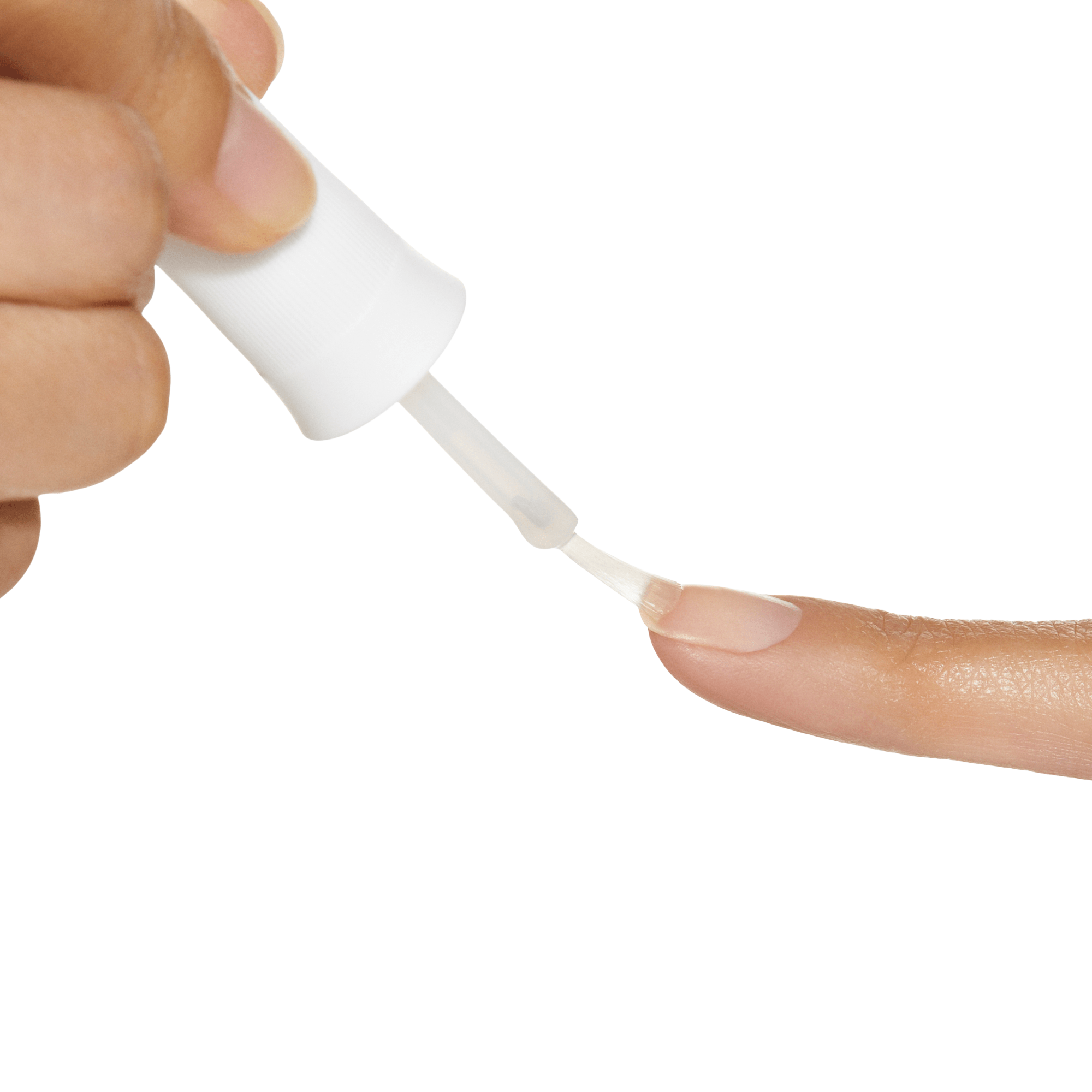 Hand holding a white brush-on applicator applying clear nail glue onto the tip of a natural fingernail, shown against a black background.