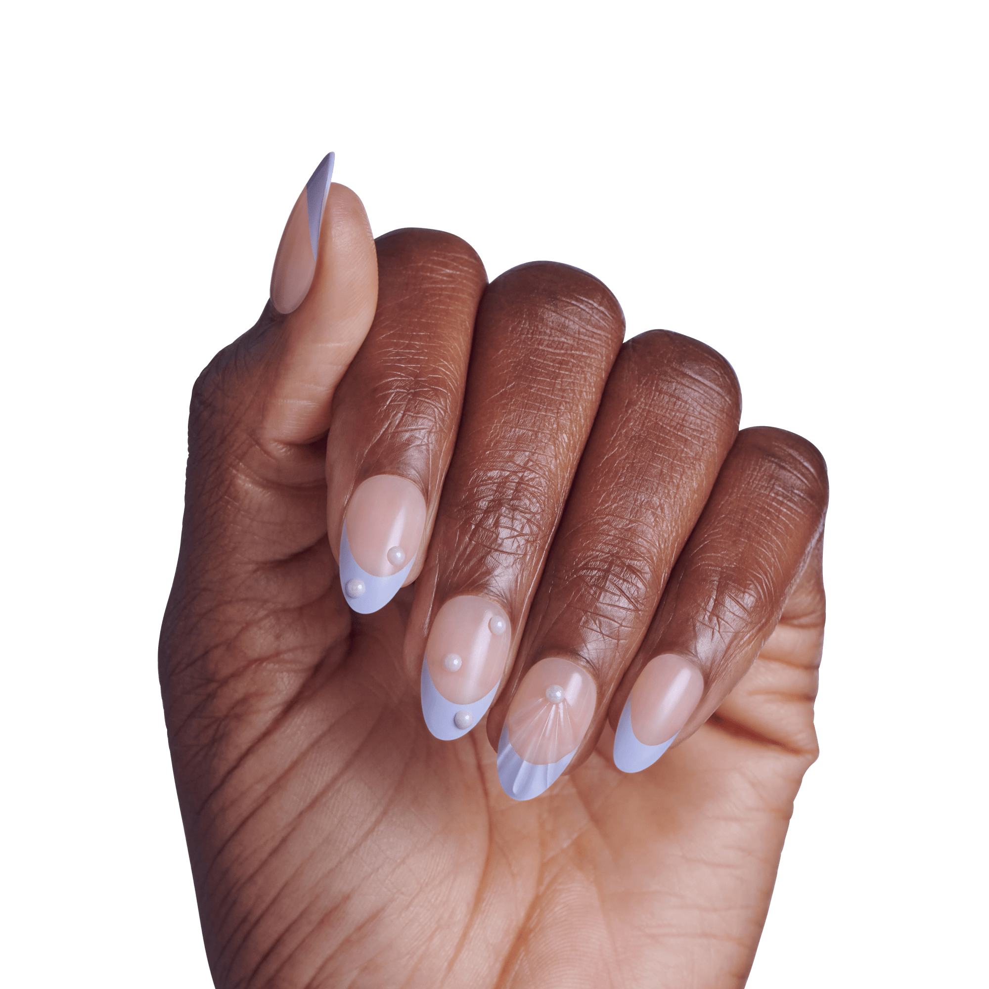 Hand with almond nails featuring periwinkle blue tips and nude base with decorative dots.