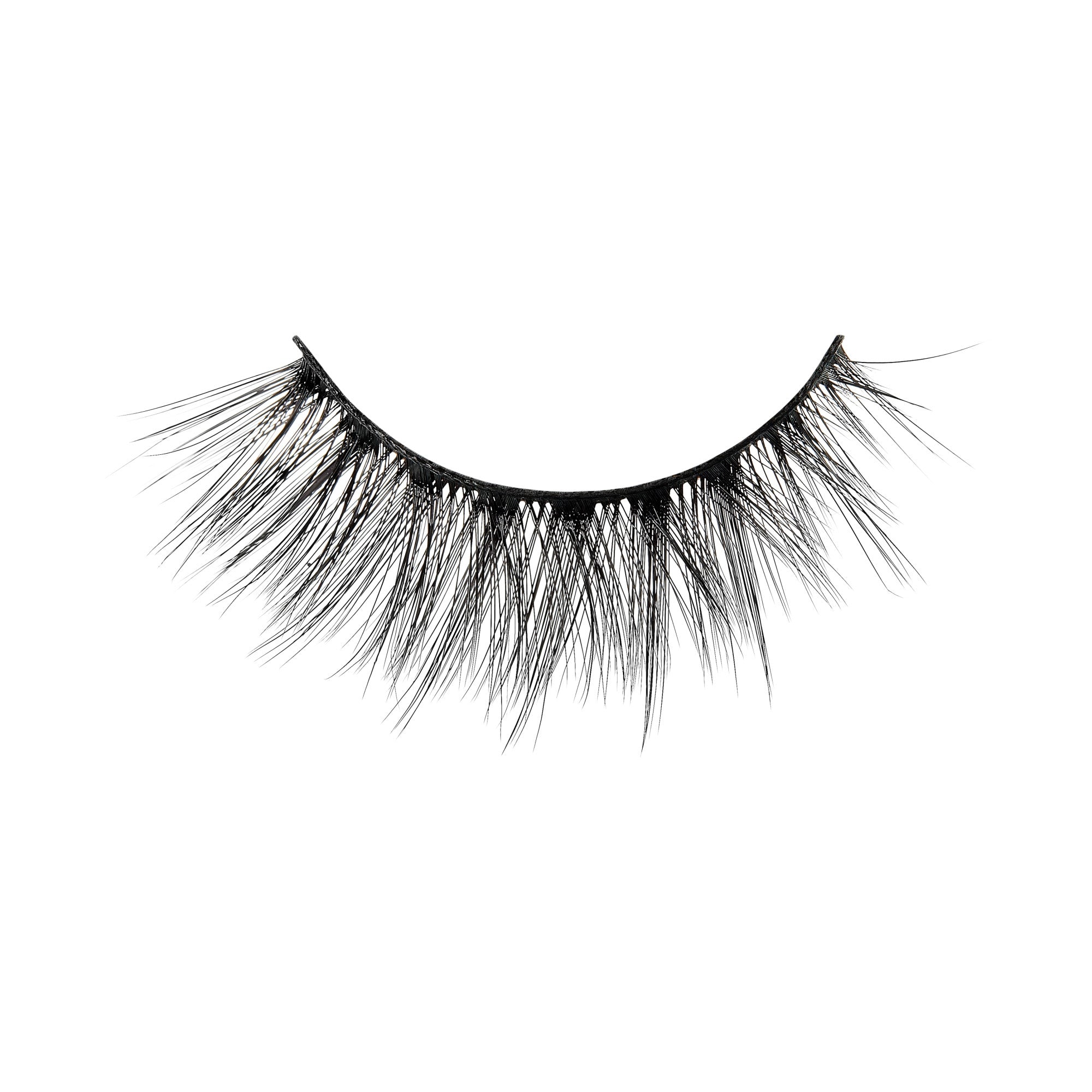 Black false eyelashes with dramatic volume and length against white background.