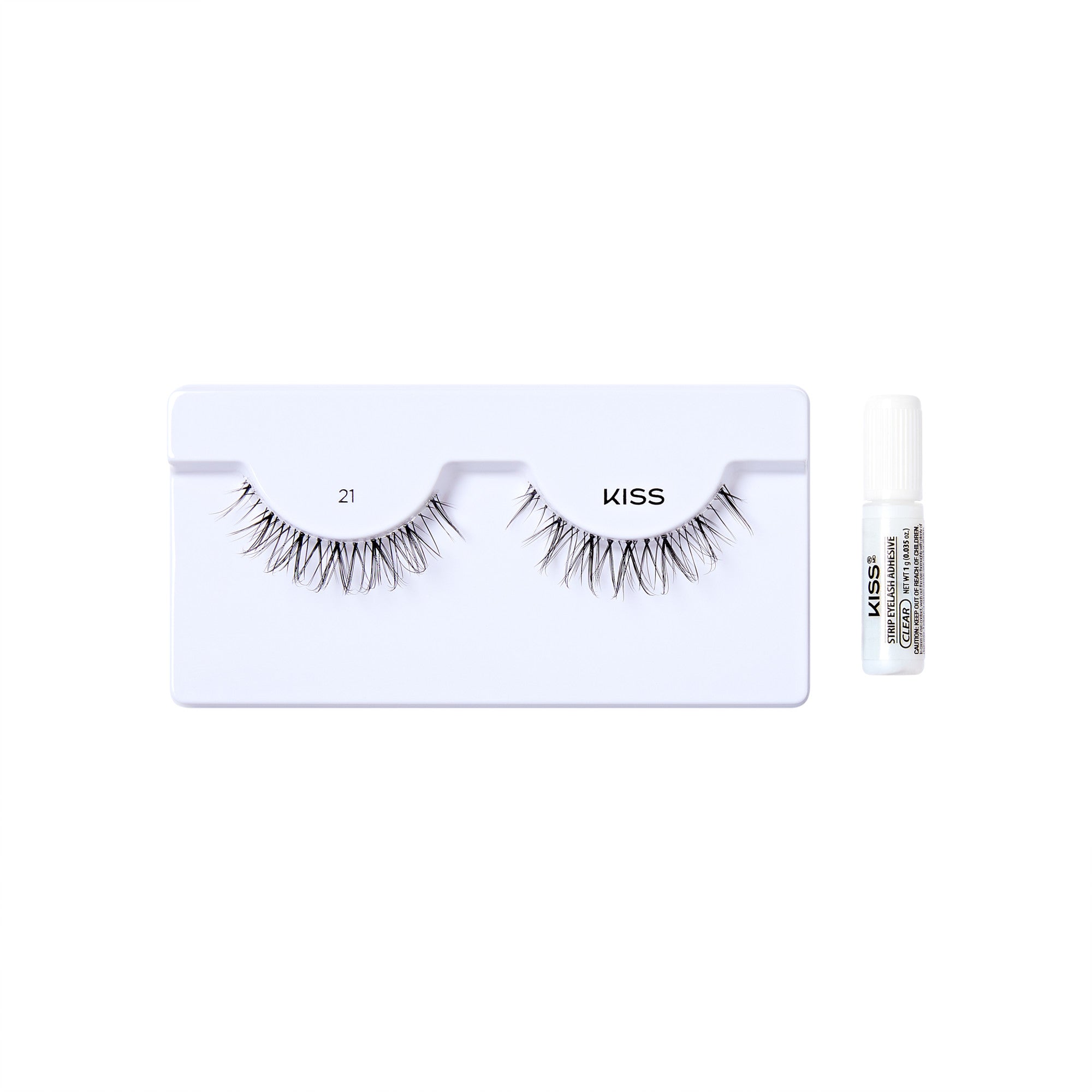 The image shows a set of false eyelashes and a small tube of adhesive. The false eyelashes are displayed on a white plastic holder, with each lash set positioned in a curved shape to mimic the natural lash line. The holder has the number "21" and the brand name "KISS" printed on it. To the right of the eyelashes, there is a small white tube labeled "KISS Strip Eyelash Adhesive" which is used to apply the lashes. The overall presentation is clean and minimalistic, highlighting the product.
