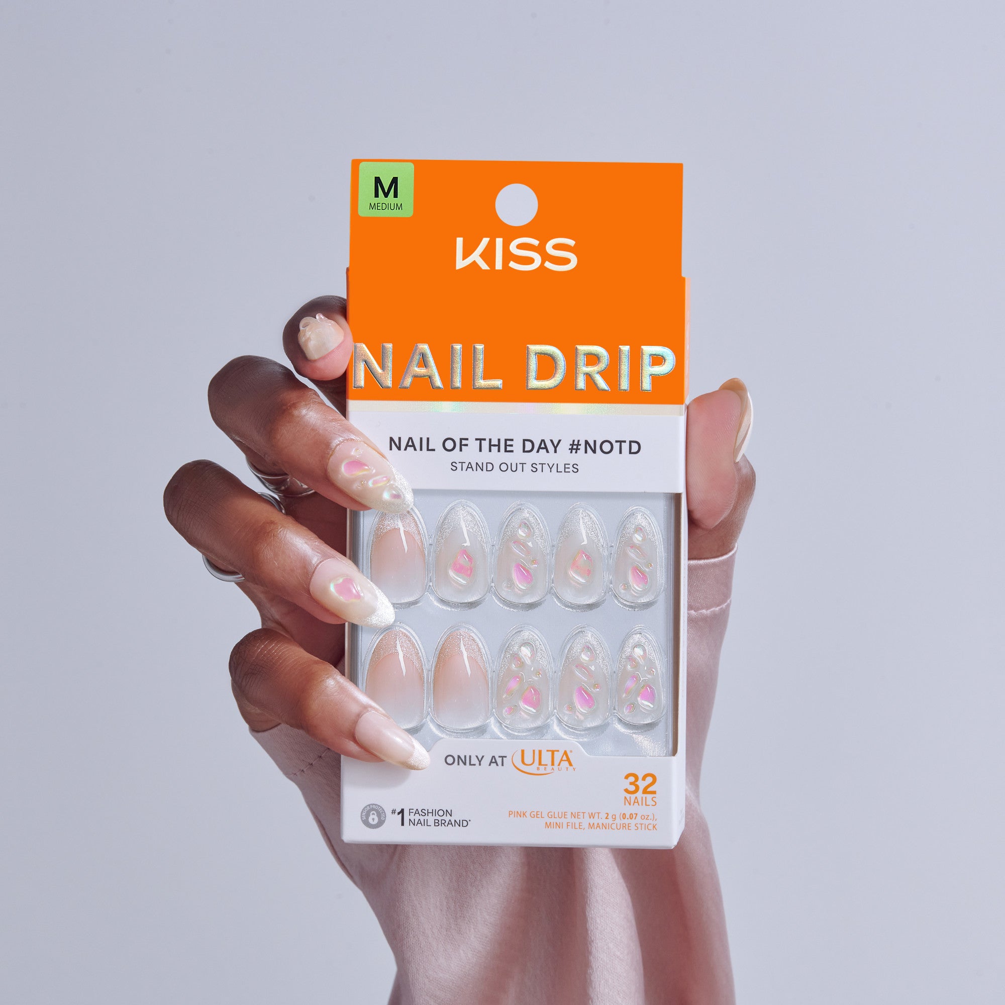 KISS Nail Drip medium press-on nails with pink gel design and white tips, 32 count.