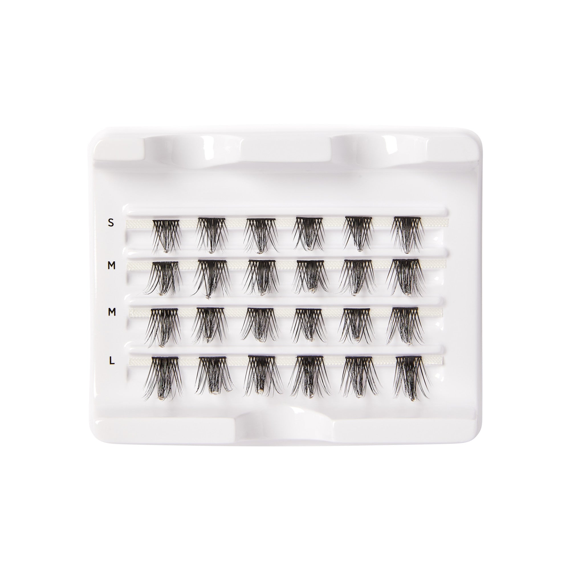 White plastic tray containing a multipack of 24 black false eyelash wisps arranged in four rows labeled S, M, M, and L by size.