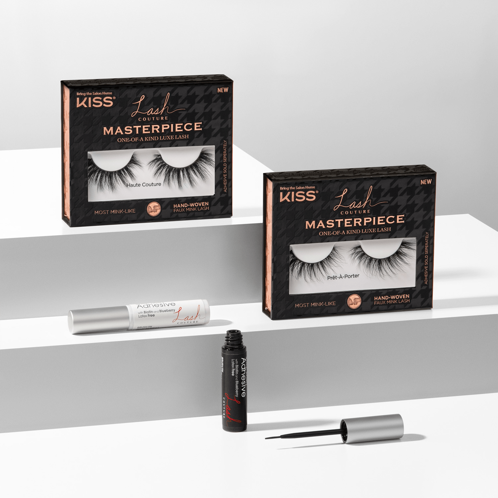 Two black and rose gold KISS Lash Couture Masterpiece false eyelash packages labeled \