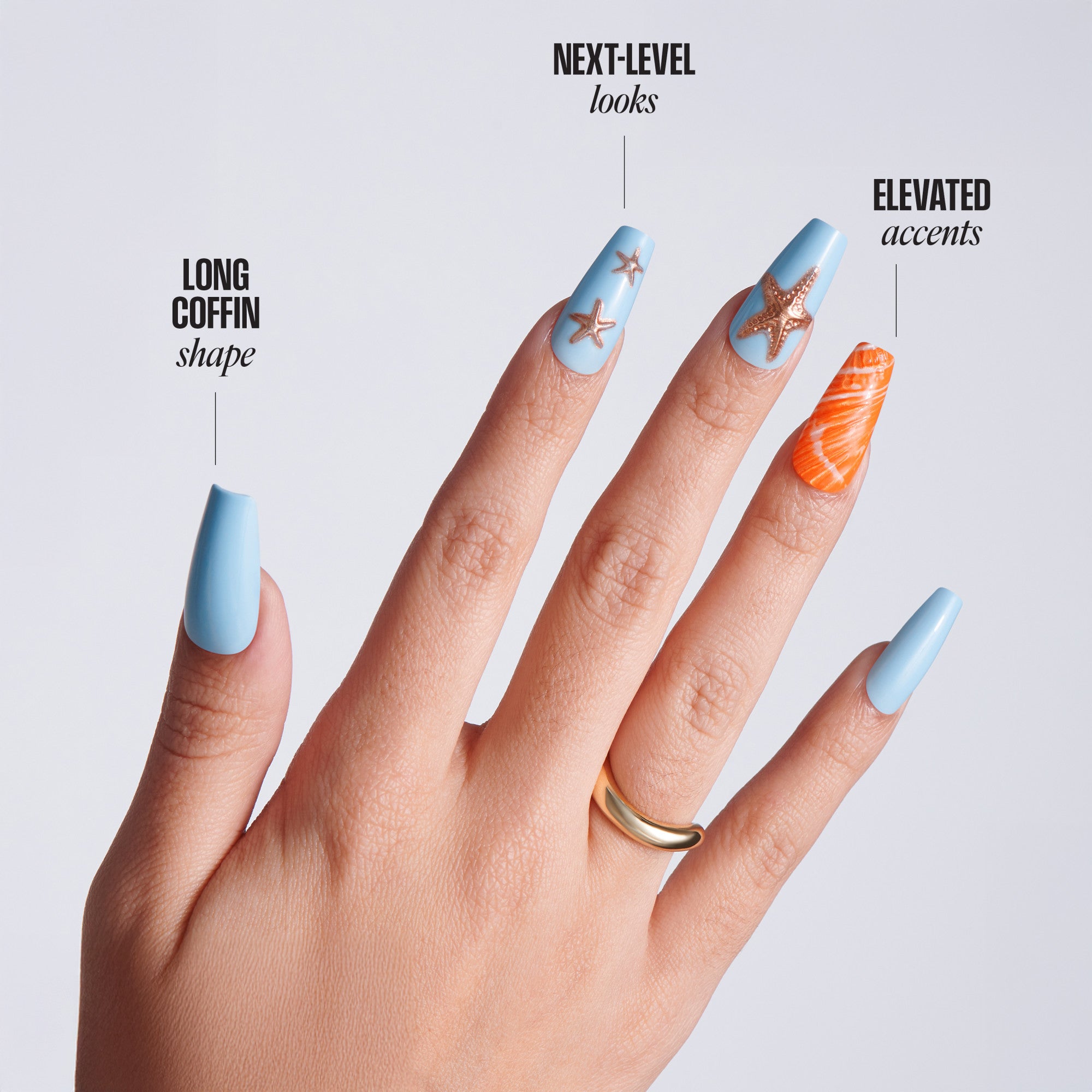 Hand with blue nail polish featuring starfish designs on a light gray background
