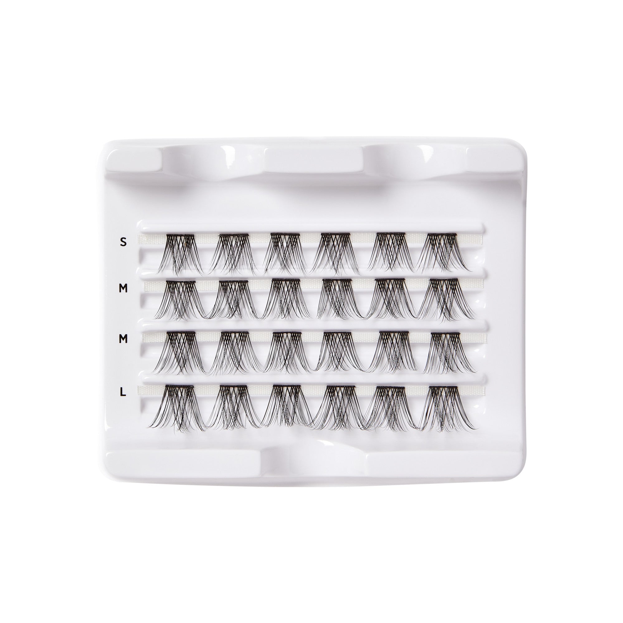 White tray holding 20 black false eyelash wisps arranged in four rows labeled S, M, M, and L indicating small, medium, and large sizes.