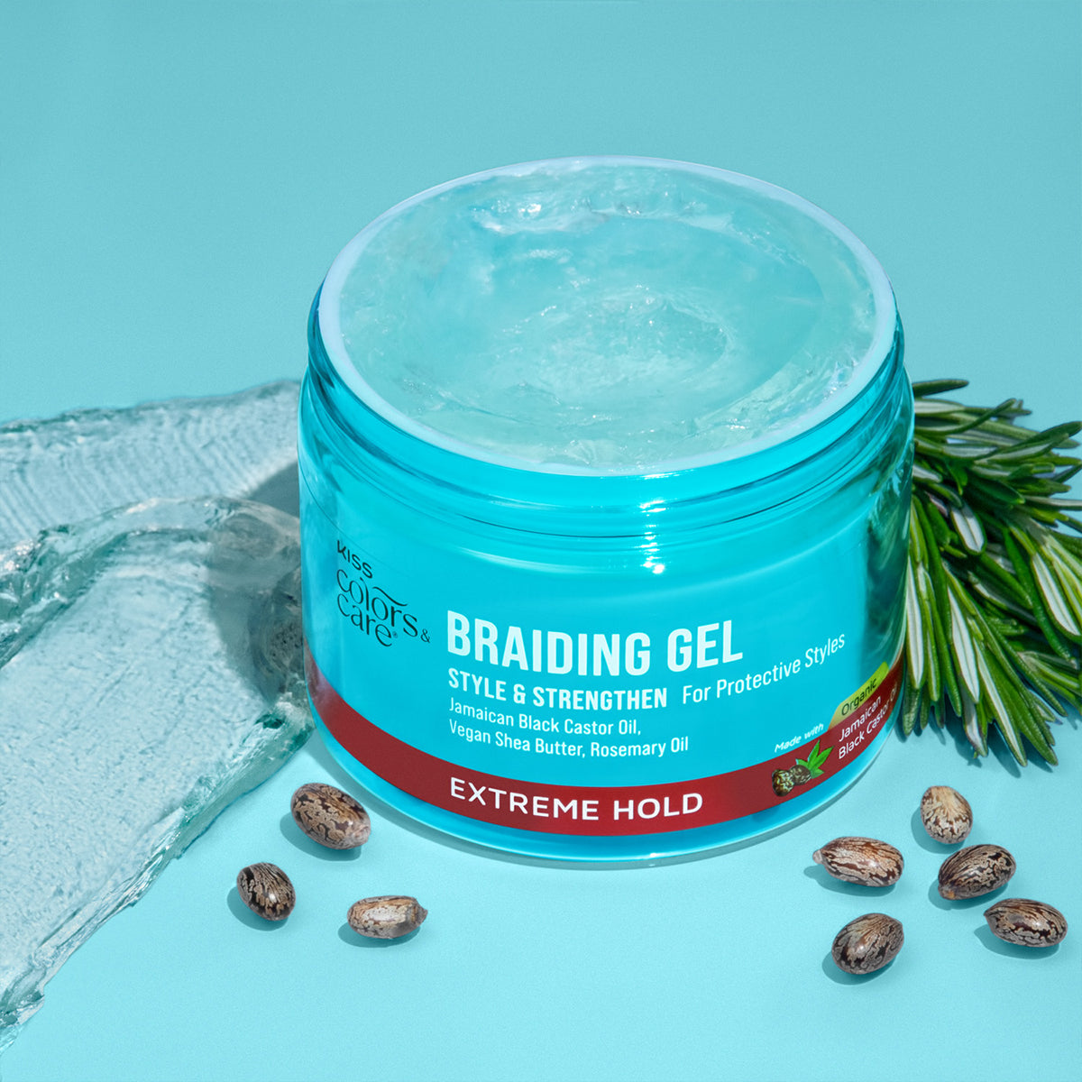 Open turquoise jar of Kiss Colors & Care Braiding Gel with clear gel inside, surrounded by castor beans and rosemary sprig; labeled for extreme hold and strengthening.