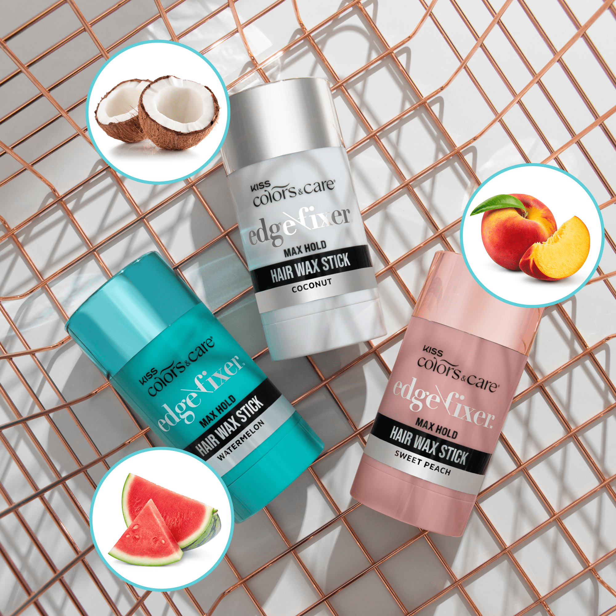 Three KISS Colors & Care Edge Fixer Max Hold Hair Wax Sticks in watermelon (turquoise), coconut (white), and sweet peach (pink) flavors on a copper wire basket with fruit illustrations.