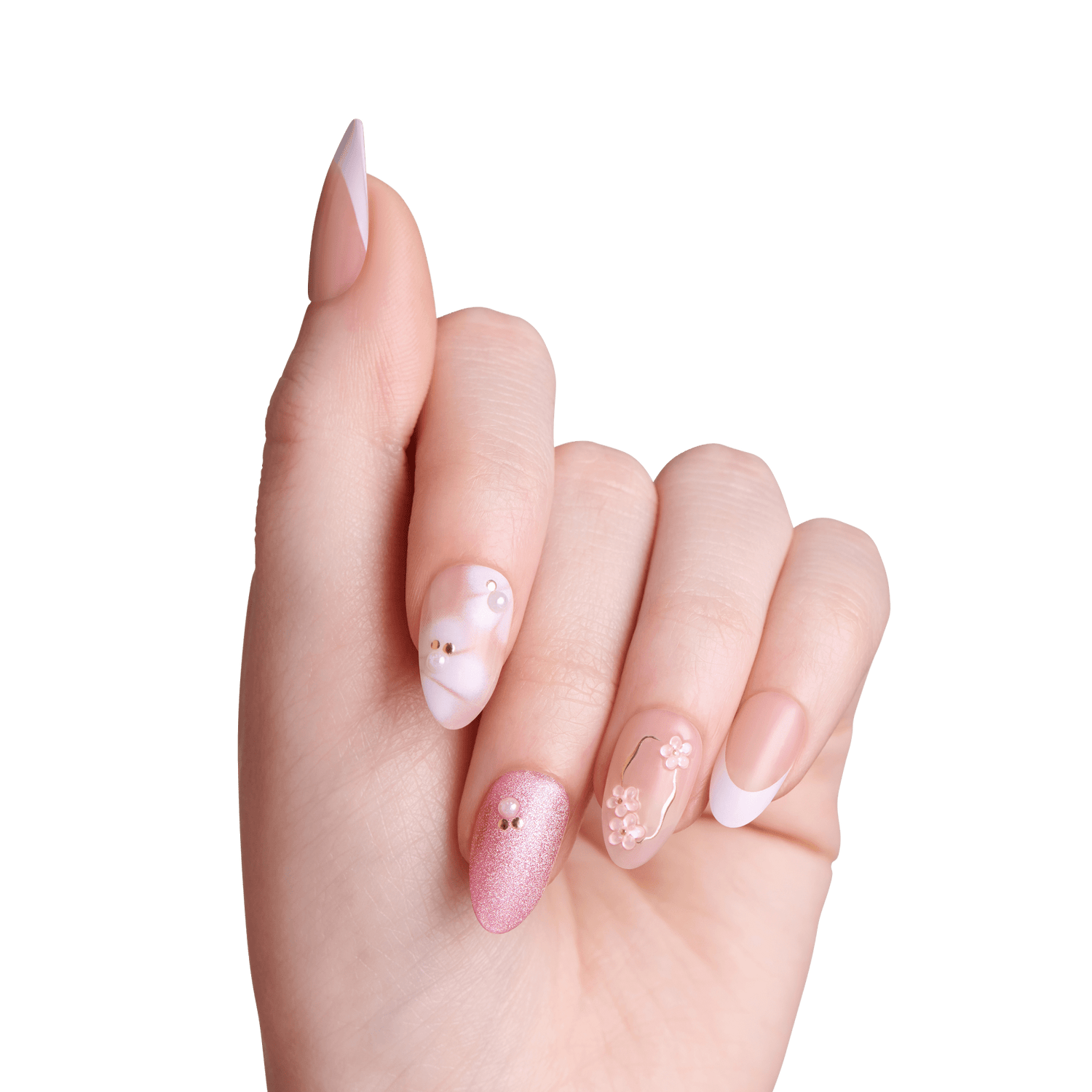Hand with decorative nail art on a green background