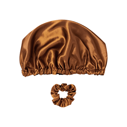 Bronze satin bonnet and hair scrunchie set against white background.