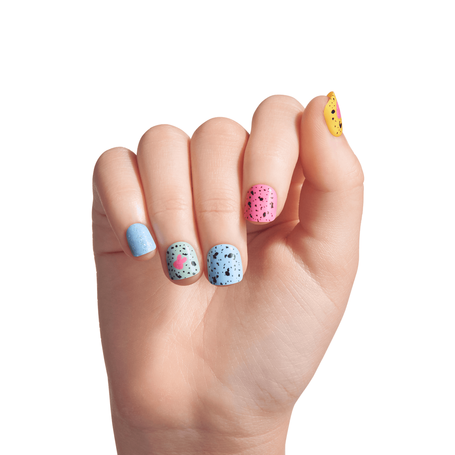 Hand displaying colorful speckled nail polish in blue, pink, mint, and yellow shades.
