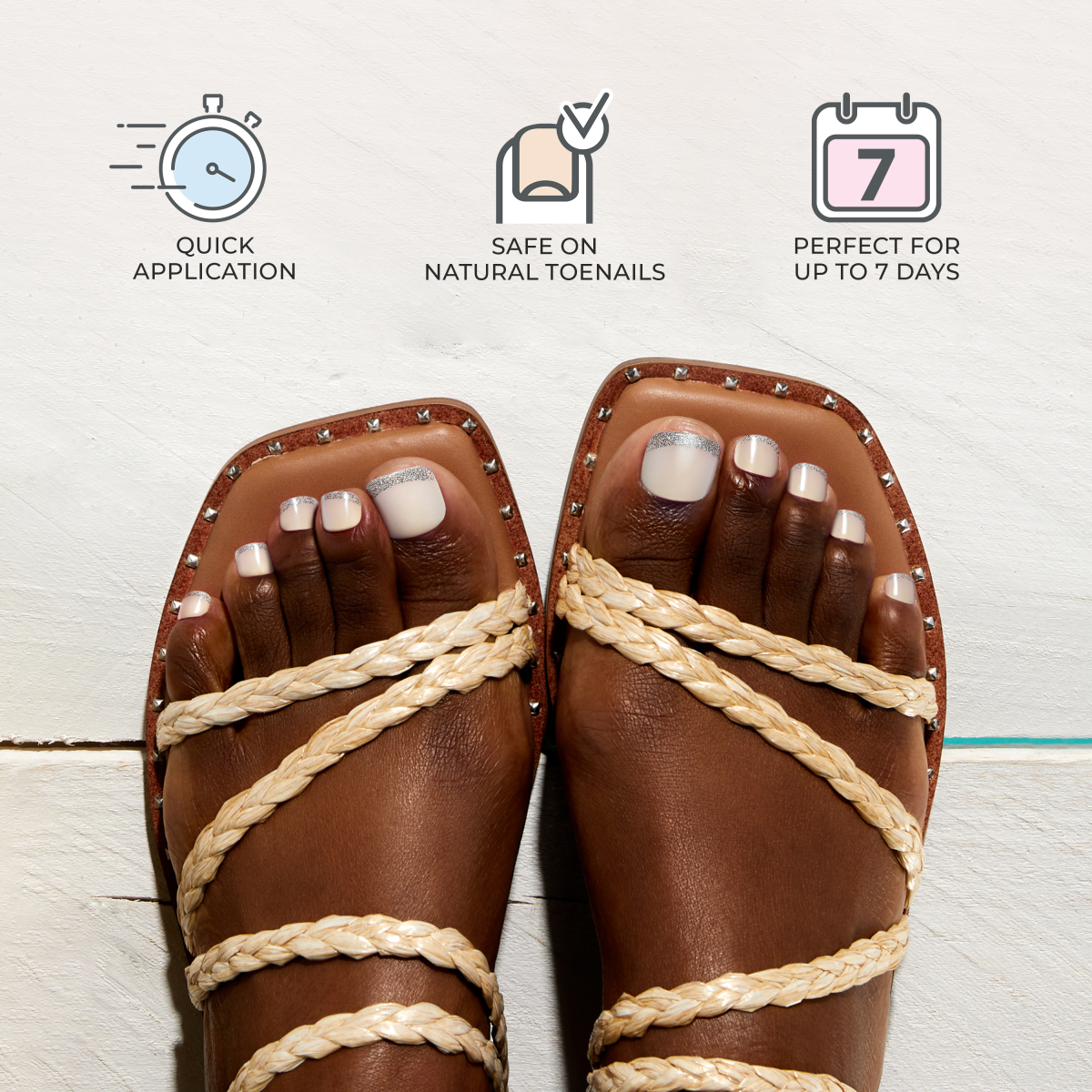 Feet wearing square-toe sandals with woven cream straps and light pink press-on toenails featuring silver glitter tips, with text highlighting quick application, safety on natural toenails, and lasting up to 7 days.