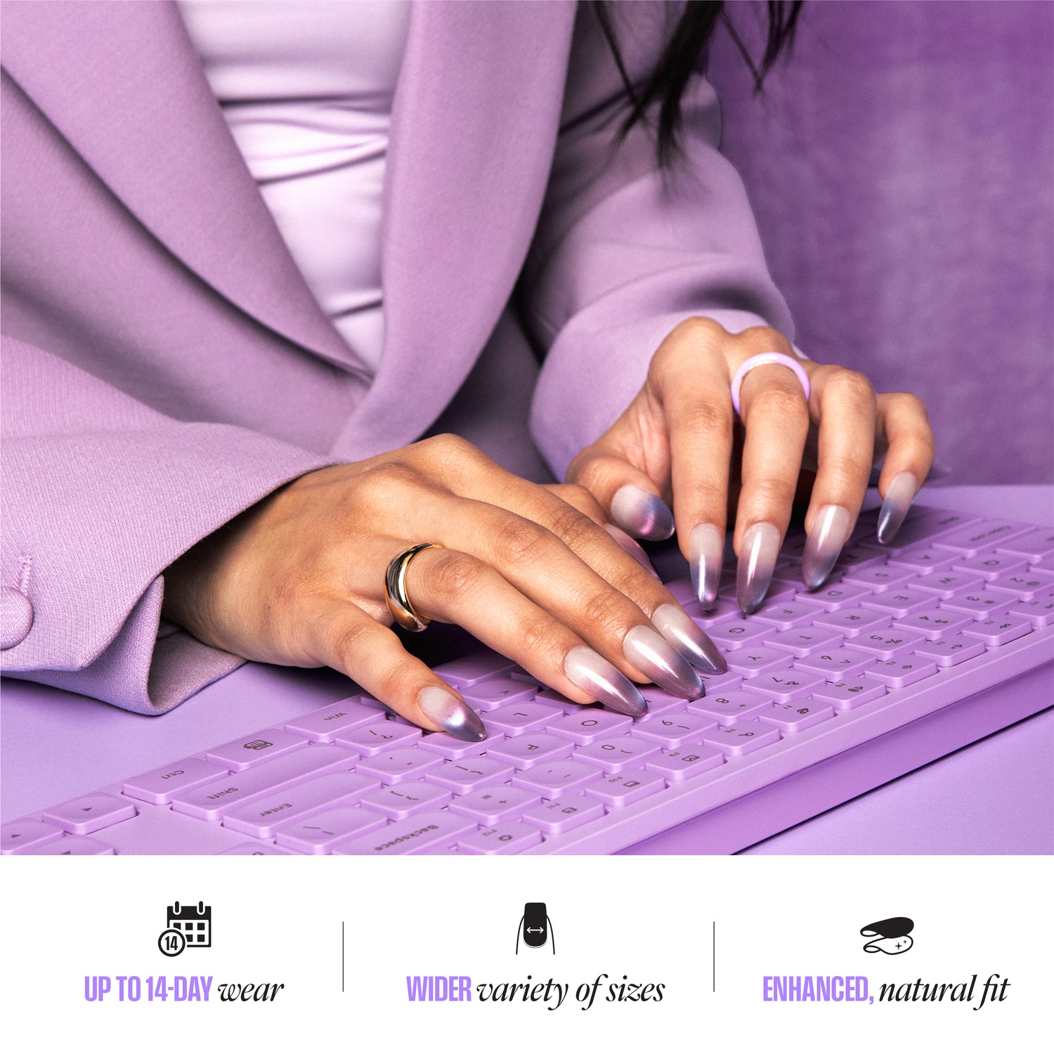 Person wearing a purple coat typing on a matching purple keyboard with promotional text at the bottom.