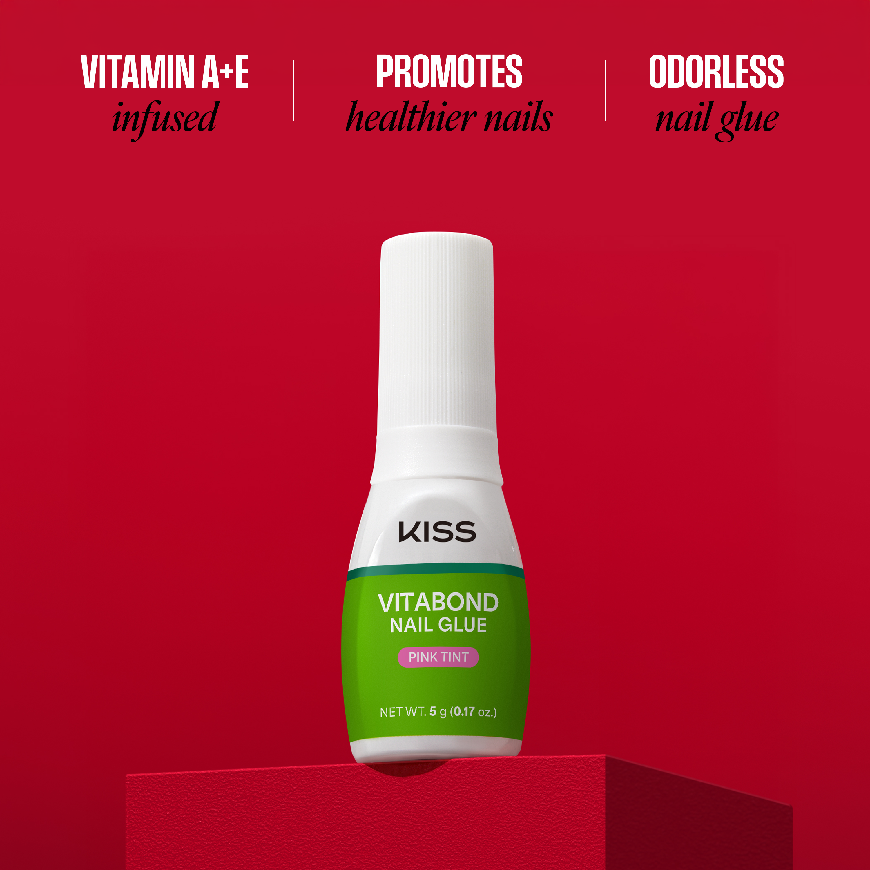 Kiss Vitabond Nail Glue bottle on a red background with product features listed.