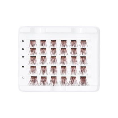 Tray of FALSCARA Wisps Multipack false eyelashes in mocha shade, arranged in five rows with sizes labeled small, medium, and large.
