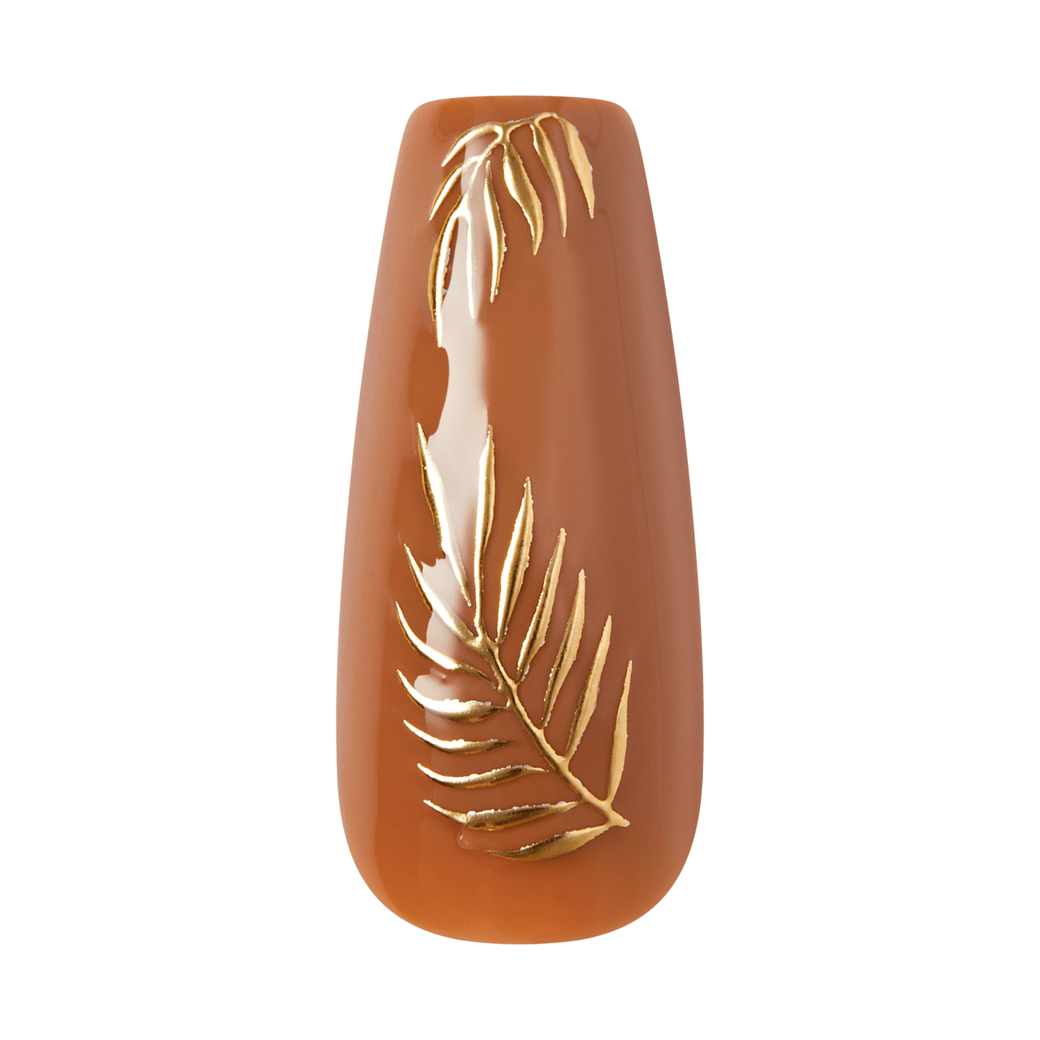 Close-up of a single nude brown press-on nail with a large 3D gold fern leaf design covering the nail on transparent background