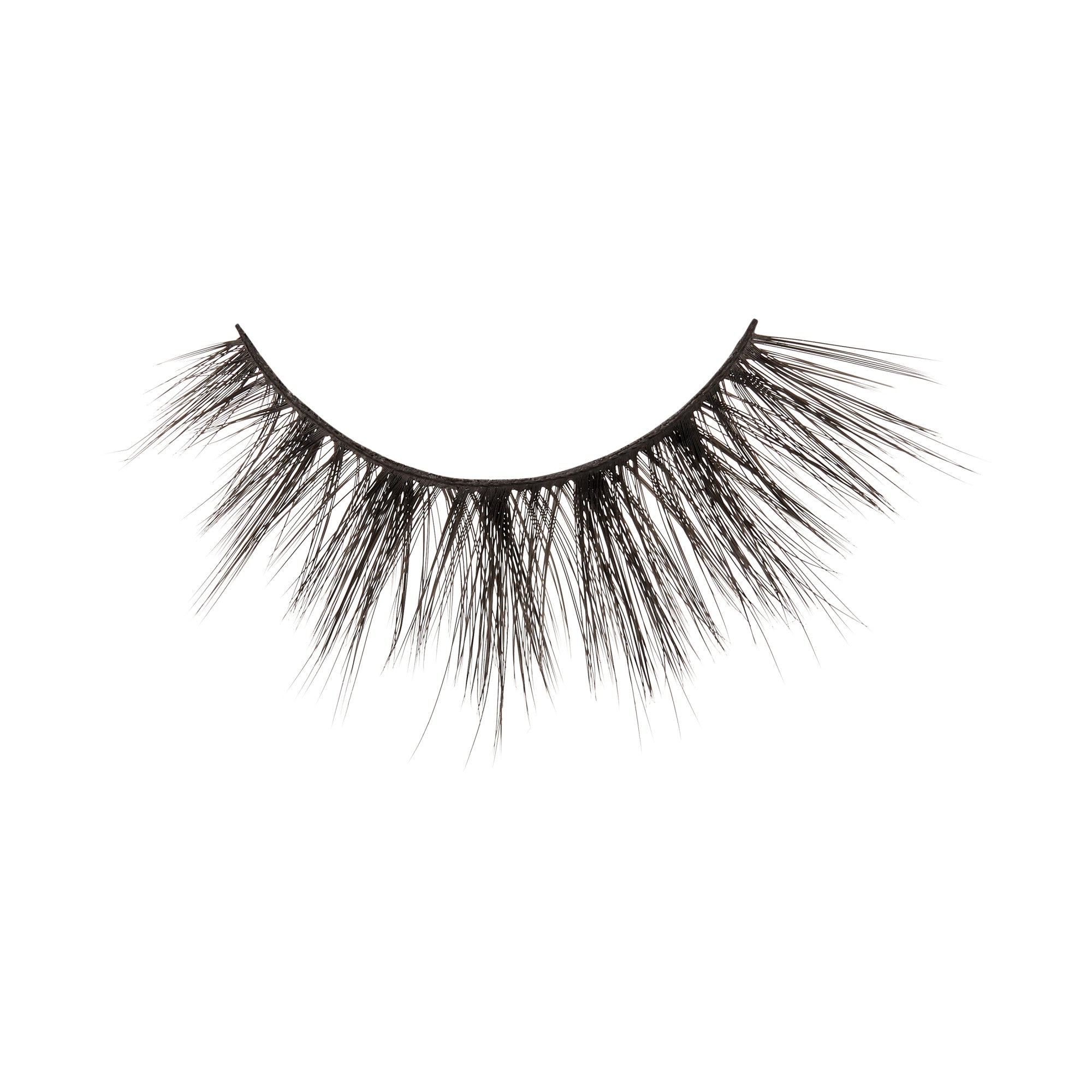 Black false eyelashes with dramatic volume and length on white background.