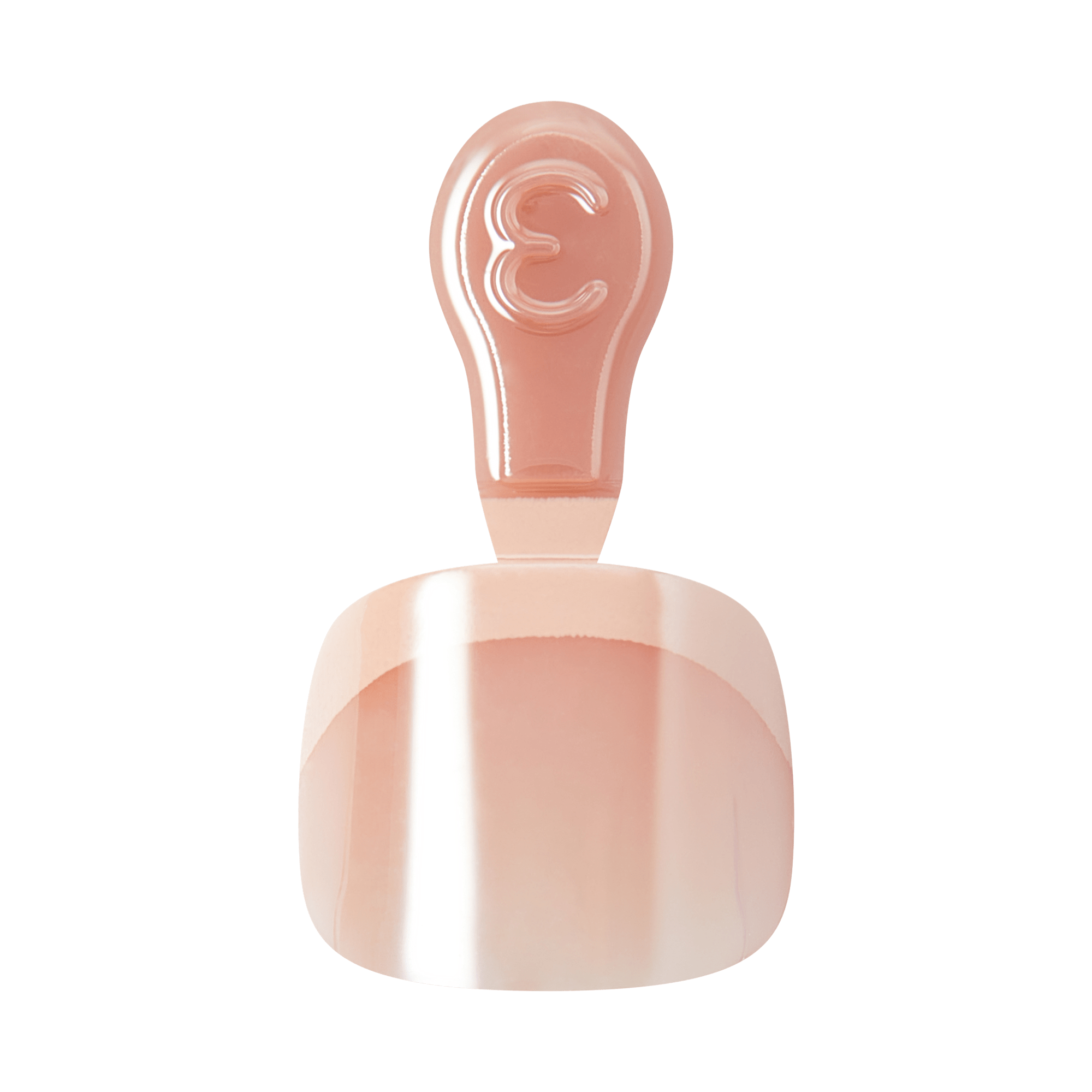 Peach-toned perfume bottle with rounded square base and oval stopper