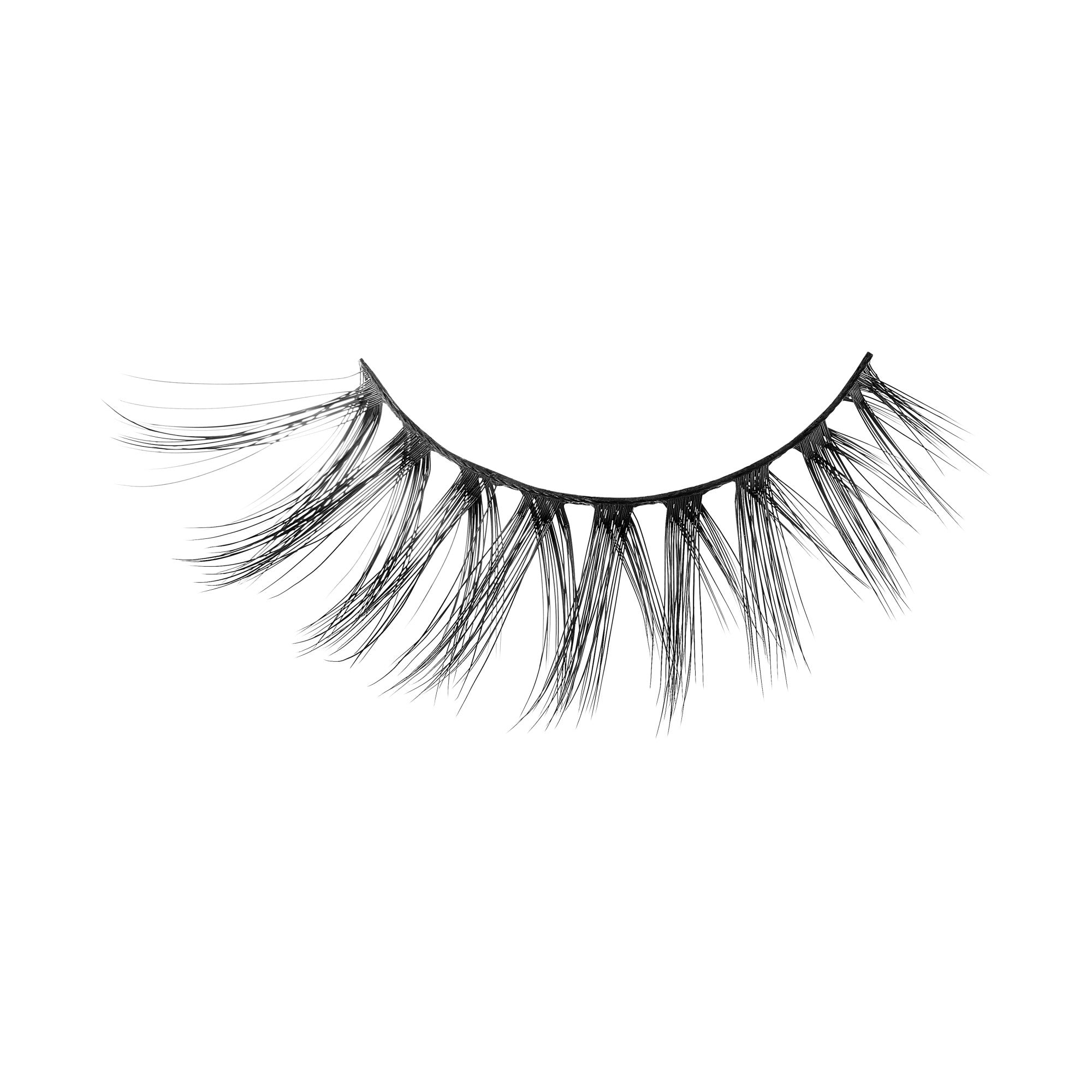 Dramatic black false eyelashes with layered, wispy strands on white background.