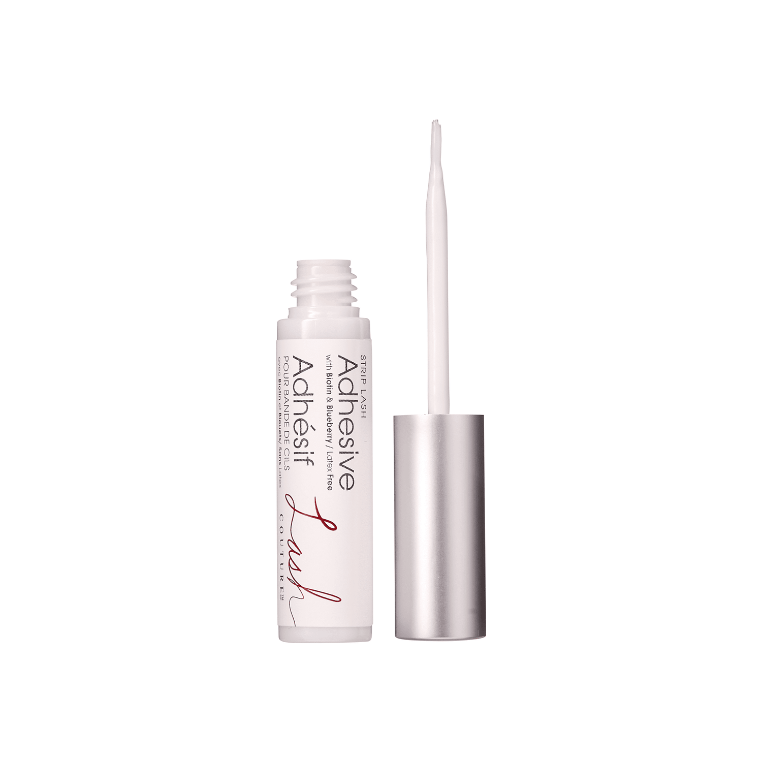 KISS Lash Couture strip lash adhesive tube in white with silver cap, applicator brush exposed, labeled \
