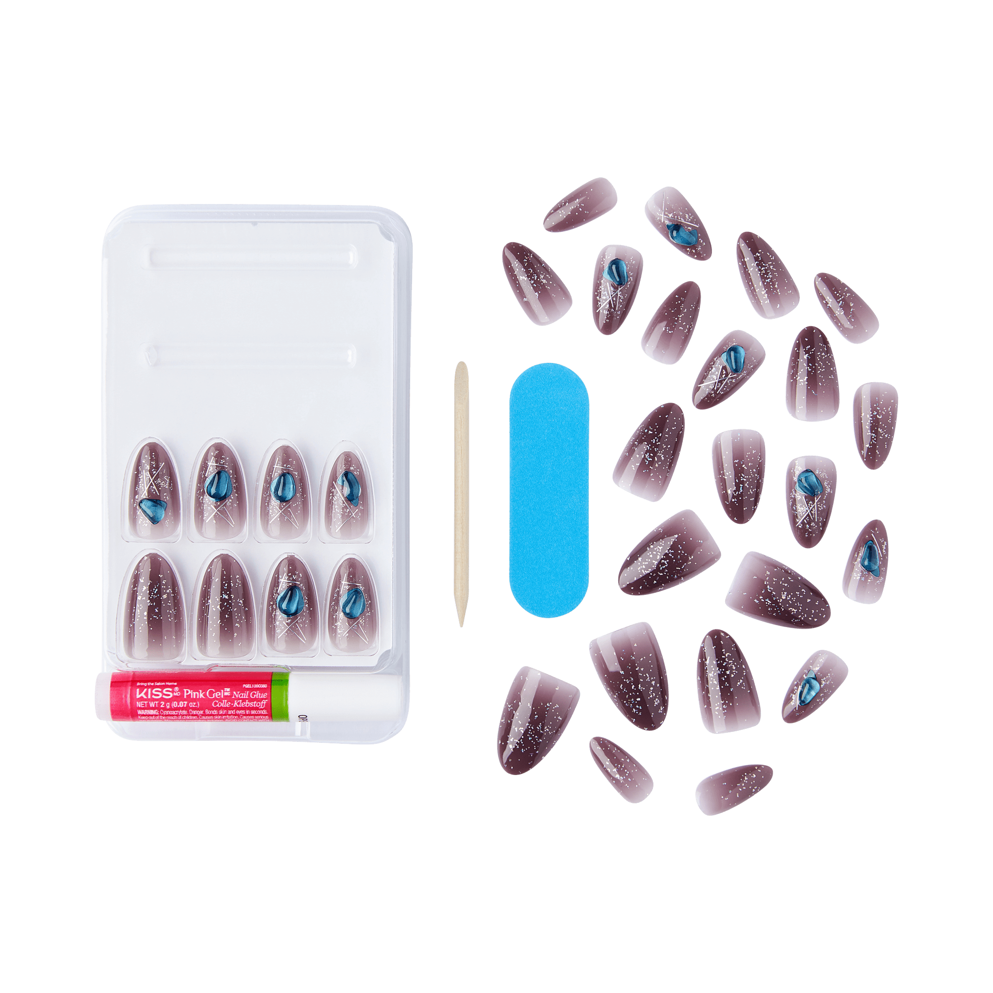 The image shows a set of artificial nails and related manicure tools. The set includes multiple artificial nails of varying sizes, each with a dark base color and adorned with blue and silver glitter designs. The nails are arranged in a plastic tray. Additionally, the set includes a wooden cuticle stick, a blue nail file, and a small tube of nail glue. The overall presentation suggests a complete kit for applying and decorating artificial nails.
