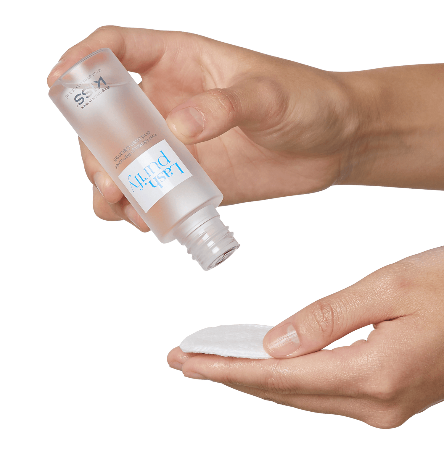 The image shows a person holding a clear bottle of liquid skincare product labeled "Lash Purity" in one hand and a round cotton pad in the other hand. The person is in the process of pouring the liquid from the bottle onto the cotton pad. The background is plain white, keeping the focus on the hands, the bottle, and the cotton pad. The bottle has a simple, clean design with a white cap and minimal text.