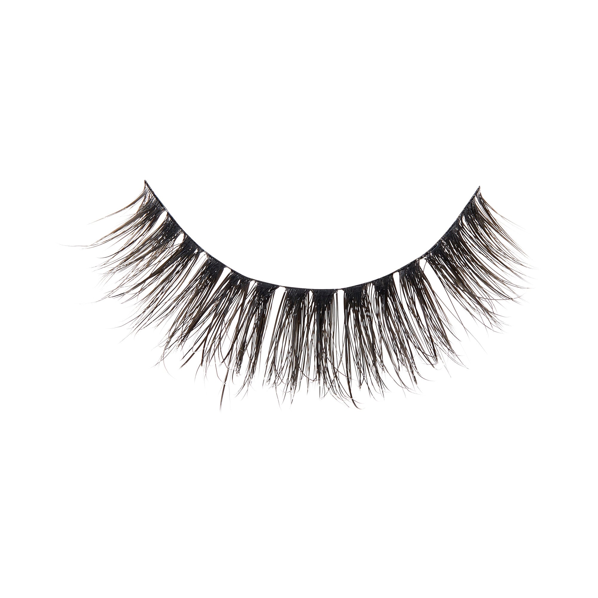 The image shows a single false eyelash. The eyelash is curved to fit the natural shape of the eye and features long, thick, and wispy black fibers. The base of the eyelash is a thin black strip, which is designed to adhere to the eyelid. The fibers are densely packed at the base and taper off towards the ends, giving a voluminous and dramatic look.