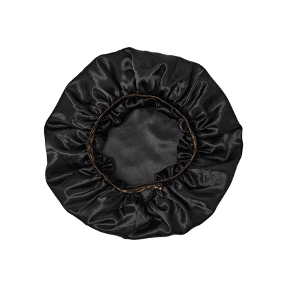 Black satin bonnet with elastic band and gathered ruffle edge.