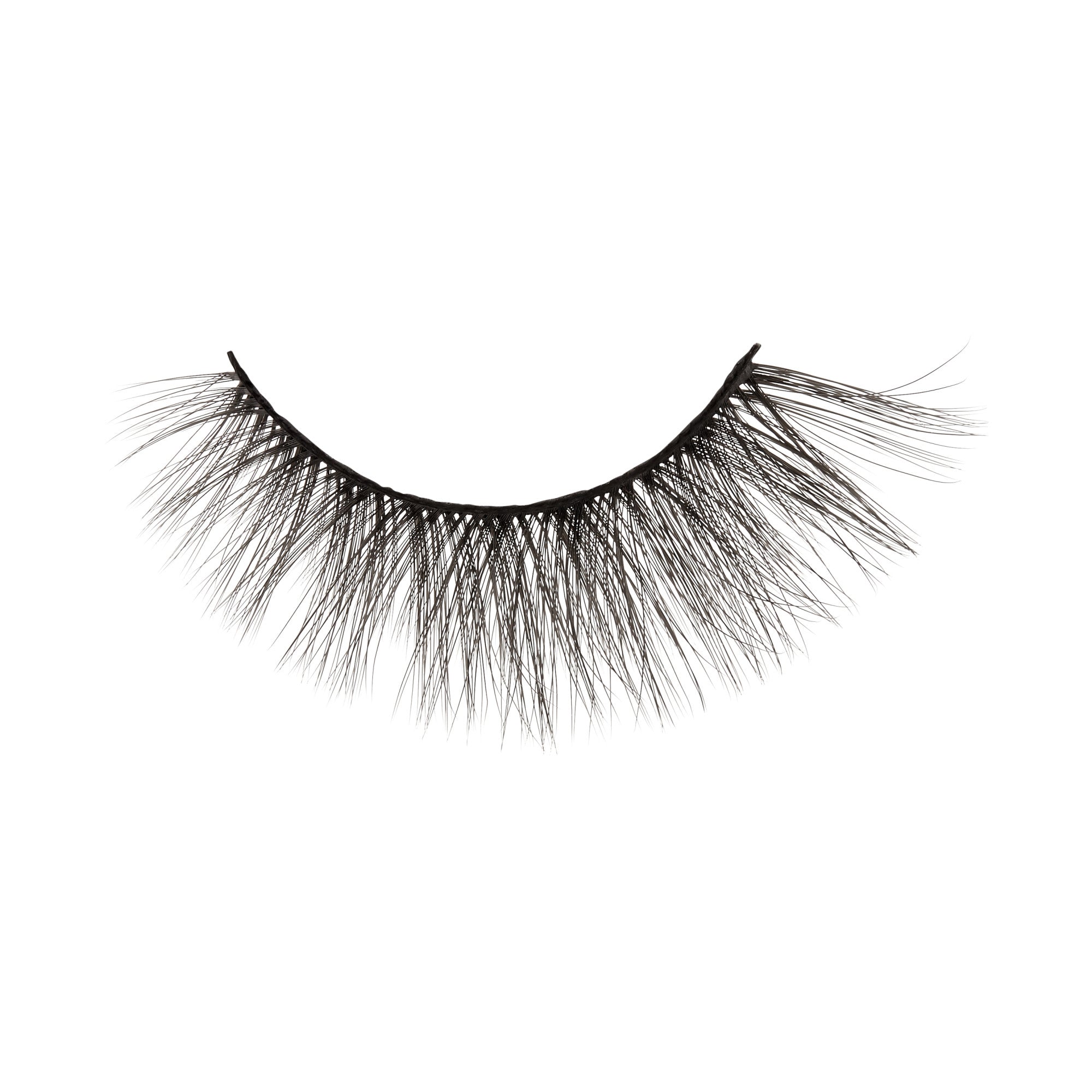 Dramatic false eyelashes with full, layered black fibers on curved lash band.