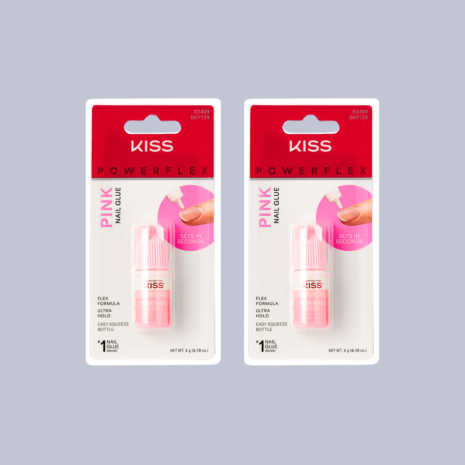 Two packages of Kiss Powerflex Pink Nail Glue on a gray background