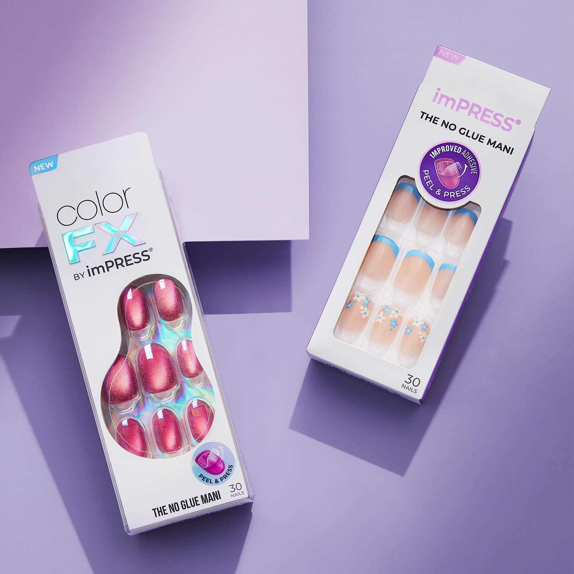 Flat lay of two imPRESS press-on nail sets on a purple surface. One features a metallic pink Color FX design, and the other includes nude nails with pastel blue French tips and white floral accents. Packaging reads “The No Glue Mani” and “Peel & Press.”