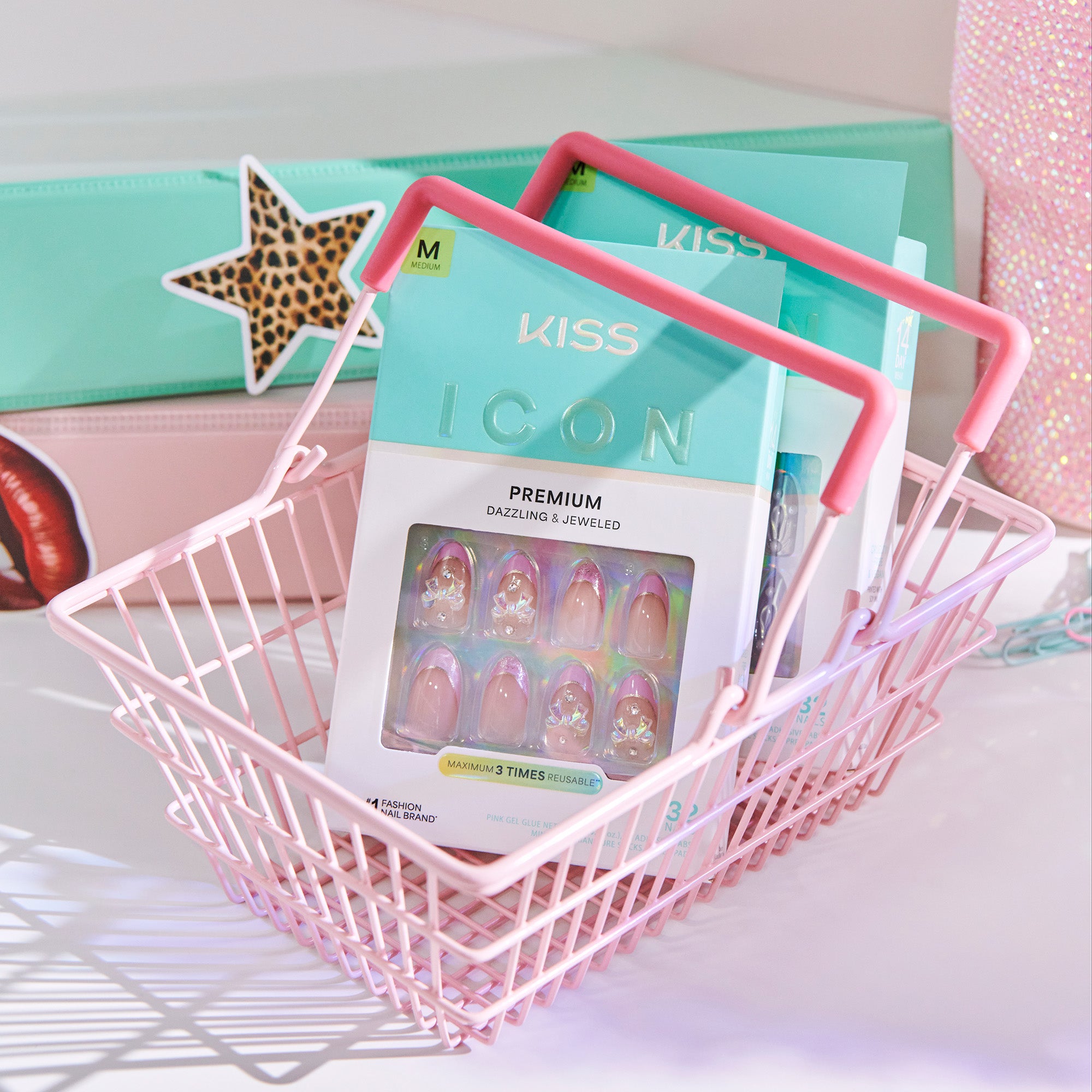 Kiss Icon nail art package in a pink basket with a white background